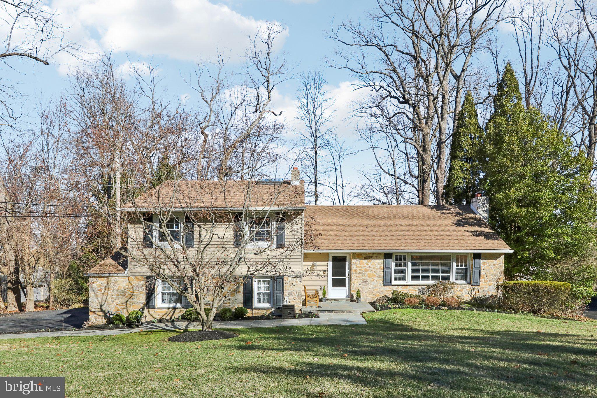 Nestled in the charming community of Friendship Hills, this well maintained 3 bedroom, 2 and a 1/2 bath split level boasts an expanded chef's kitchen, newly updated baths, hardwood floors throughout, composite decking overlooking professionally designed and maintained lawn.  As you enter the welcoming foyer, you feel the warm flow of the home with the raised ceiling Living Room just to the left.  A beautiful stone fireplace has an insert for warmth, and you'll notice the home is wired for sound throughout. The Formal Dining Room is open to the Living Room, and there's French Doors to the Deck for entertaining. The heart of the home is the updated and expanded Gourmet Kitchen, there is more than enough room for people to congregate during meal time. Granite countertops, gorgeous cherry cabinets and a huge 6 barstool seat island. Five burner range and custom backsplash add to the beauty of the kitchen.  Beautiful windows and access to the deck make easy access to outside. The custom, sound proof Office is located just below the tip of the Kitchen. Glide through the foyer to the upper level, where the Primary Bedroom  and Primary Bath with it's custom tile work and jetted tub are your retreat! There are two other sizable bedrooms and a new hall bath with marble tile floor, subway and glass tile shower. The sky light in the hall is newer, water tight and has a remote for shade. Down to the recreation room, with it's own Powder Room for guests, the bay window looks out over the back yard where you'll see deer wonder through. The laundry room is on this level next to the over sized garage. Lots of cabinets for storage! Plenty of parking in the driveway, and the seller is leaving plans if you want to expand. The property had a survey last year, so you'll see the orange flagged markers. Newer roof (2017) and updated heater (2020) and water heater (2016) make this home move in ready. Award winning Tredyffrin-Easttown School District is among the elite in the state, and there is quick access to the Paoli Train Station. A quick jog to Chesterbrook , 5 minutes to Gateway Shopping Center and 10  minutes to King of Prussia Mall. A must see to appreciate all the care that has gone into this home.