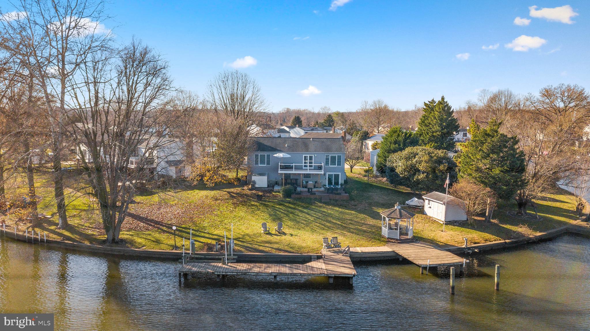 Perfectly situated at the end of a quiet cul de sac is this waterfront 4 bedroom, 2 full and 1 half bathroom house with designer touches throughout.  Thoughtfully updated with neutral paint, fresh lighting and updated kitchen and baths, this home has it all- including 125' of water frontage on Taylor Creek.  Designer inspired kitchen with white cabinetry, tiled backsplash and stainless appliances.  Big views from nearly every room!  Rear yard is perfect for entertaining.  Storage shed plus 1 car garage.  Close to shopping, dining & entertainment. Schedule your private tour today!