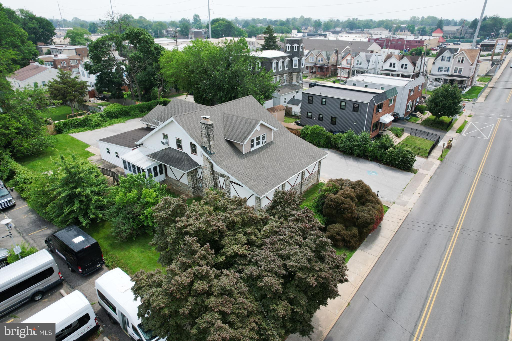Excellent investment or redevelopment opportunity in a high-visibility location near the Collingdale Municipal Building, gas station, and other local conveniences. 
Previously used as a doctor’s office, this property offers flexible potential for medical, office, commercial, or mixed-use purposes, featuring live-in quarters on the main level and an apartment on the second floor.
Highlights include multiple rooms, kitchen space, a full basement, two-car garage, and ample parking for up to 15 vehicles. Bring your vision to transform this versatile property in the heart of Collingdale.