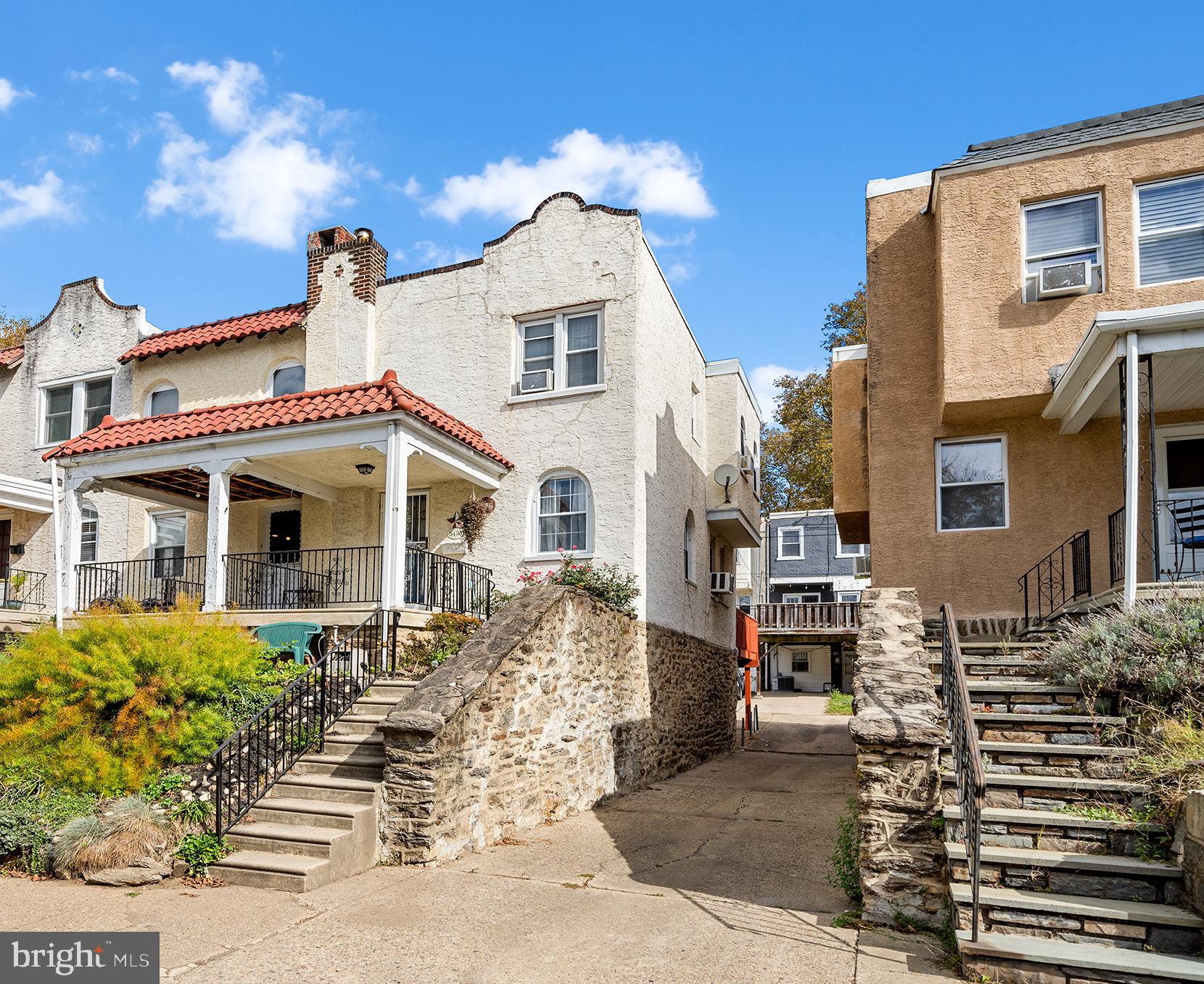 East Falls Beauty. This charming row home featuring two exposures and situated at the top of Sunnyside Street for abundant natural light, original detail (from the terracotta roof tiles to the hardwood floors to the door trim and hardware) will wow you from the moment you step into the graceful main living area. You'll appreciate the open concept floor plan that allows for easy daily living and entertaining from the front porch all the way through to the rear deck. The well appointed kitchen is highly functional, features a surplus of cabinets, modern appliances, bold backsplash, and pantry area adjacent to the deck. The upper level offers 3 bedrooms and a vintage hall bath with classic ceramic tile and pedestal sink. The basement features great ceiling height for future living space expansion, laundry room and access to rear driveway and garage. The front exterior features wonderful gardening potential. Located minutes from Kelly Drive and the Wissahickon Trail network, this area of East Falls is a dream come true for nature lovers, runners, hikers and bikers, super convenient to Center City with East Falls Regional rail station an 8 minute walk from the front door. Thomas Jefferson University, Drexel University College of Medicine are minutes away along with the great cafes along Midvale Avenue, Main Street in Manayunk and Germantown, not to mention I-76. Make your appointment today. You will not be disappointed. Seller will not make any repairs. FHA buyers will be responsible for any Lender required repairs. Buyer responsible for U&O.
