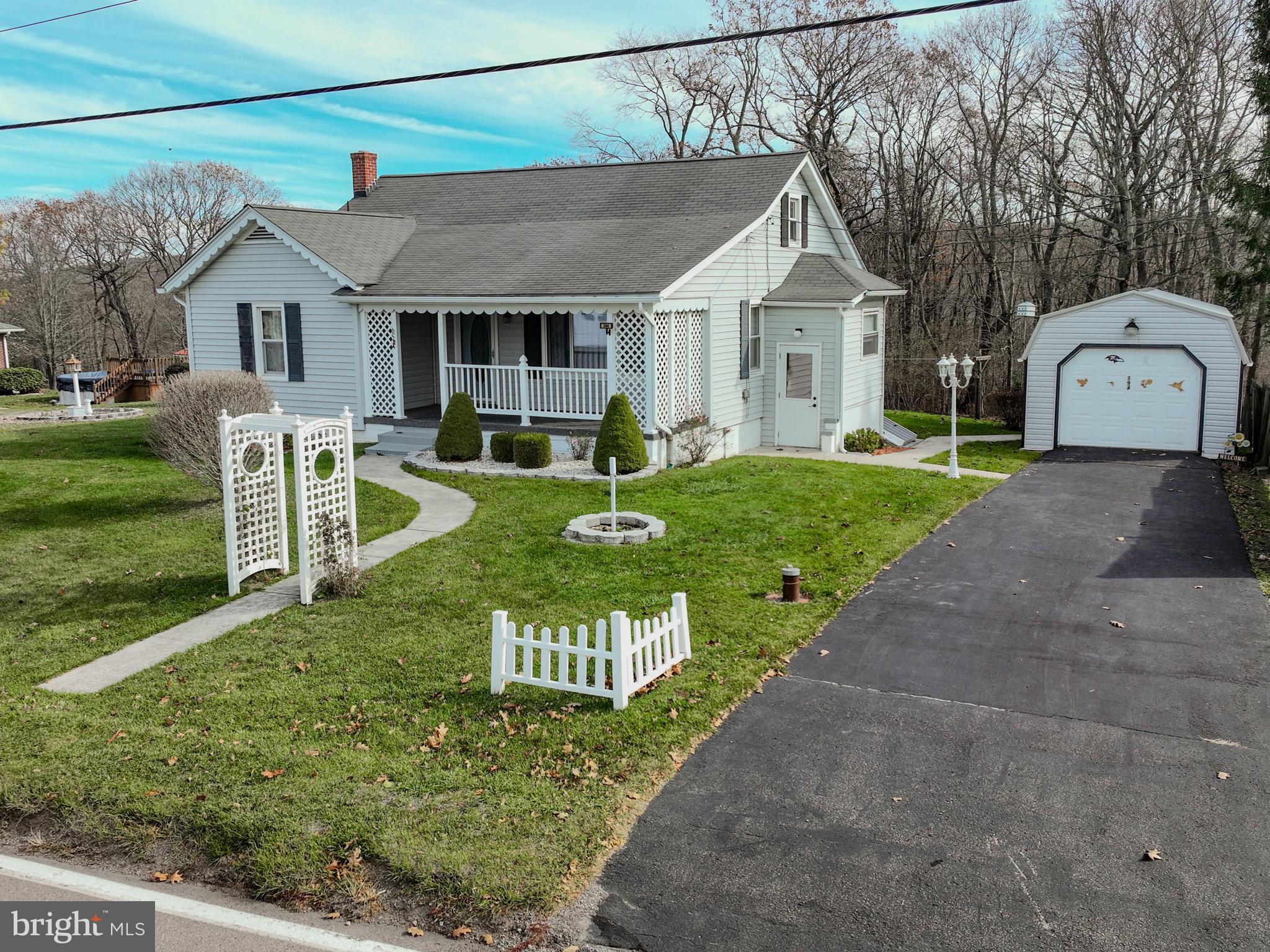 This charming 3-bedroom, 1-bathroom residence is ideally situated on a level lot, offering a perfect blend of comfort and convenience. With multiple main level bedroom options, this layout caters perfectly to your lifestyle needs—whether you're a growing family or seeking a versatile space for guests or a home office.

As you step into the home, you’ll be greeted by a delightful vintage kitchen, brimming with character and timeless charm.

The property features a paved driveway, providing easy access and plenty of parking space for you and your guests. In addition, the additional storage shed offers endless possibilities for organizing outdoor tools or setting up a cozy workshop.

Conveniently located close to I68, commuting for work or recreation is a breeze, making this home an ideal choice for busy professionals and families alike. Don’t miss out on the opportunity to own this lovely home that beautifully combines vintage aesthetic with modern convenience. Schedule your showing today!