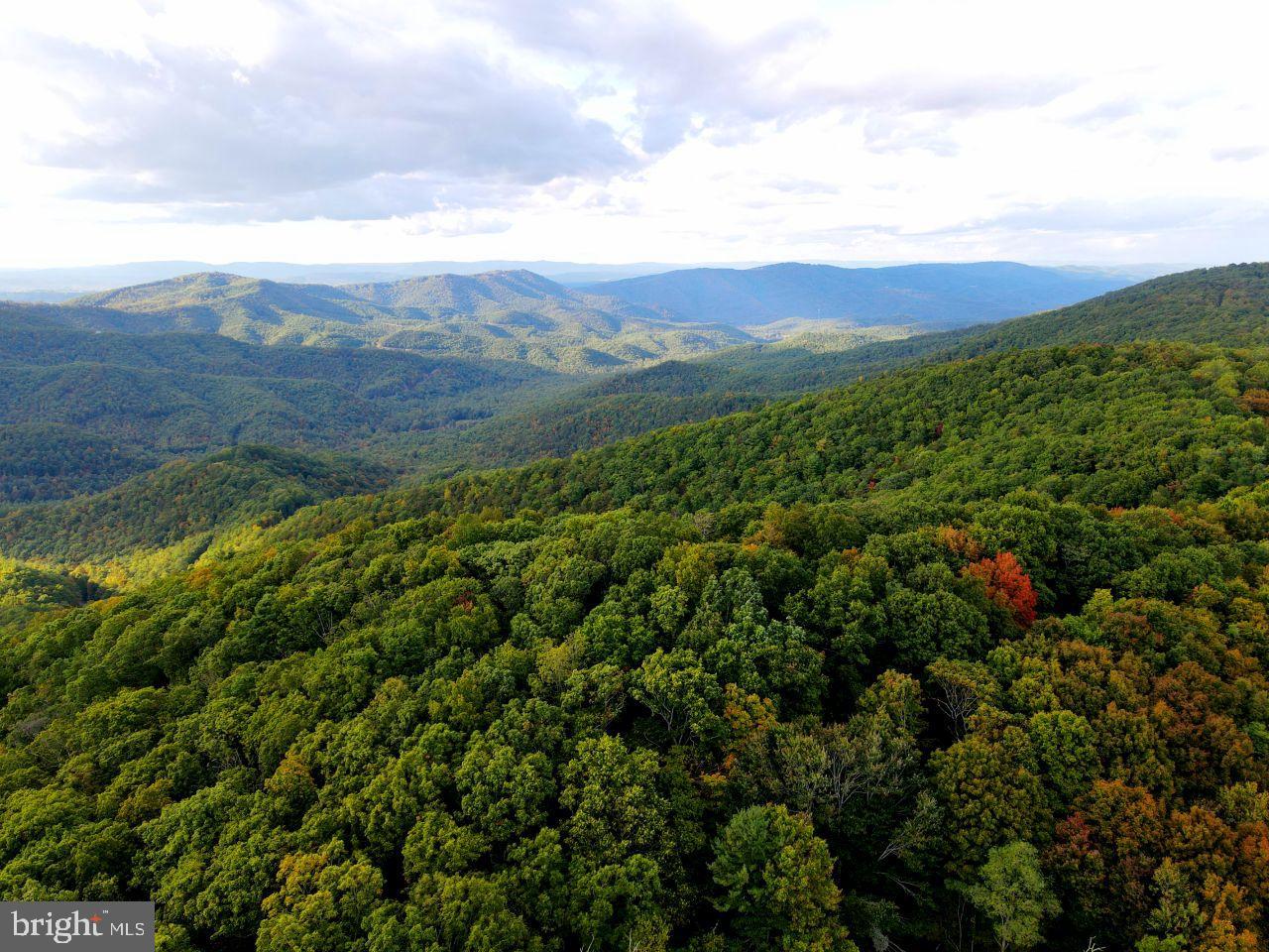 500.5 Acres of amazing West Virginia mountaintop. Located just above the Greenbrier Resort in White Sulphur Springs, WV. Perfect combination of open & wooded land. Small pond. Monroe County, West Virginia taxes. 431 of the 500.5 Acres is in Managed Timberland. Property is home of a fire tower that has been removed, but the primitive cabin still remains. Great views, awesome property, close to Greenbrier. Monroe Co., WV Schools: Mountain View Elementary & Middle, James Monroe High.
