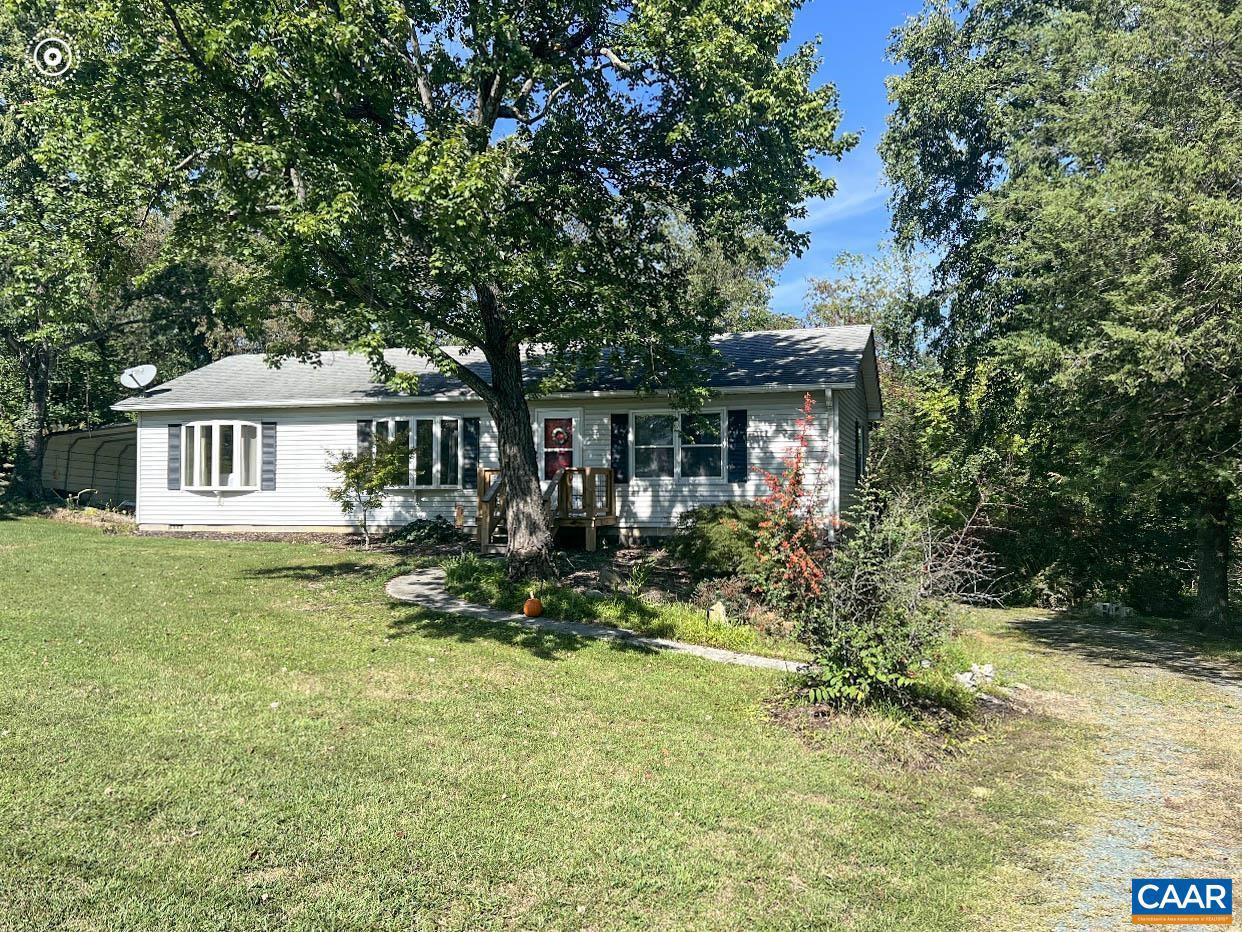 Charming home located near downtown Crozet.  Close to Western schools, mint springs park, shopping, restaurants, wineries, breweries.  The home is in pristine condition.  New hardwood floors, HVAC, newer roof, and more.  The yard is very spacious on a great corner lot featuring beautiful landscaping.  Large back deck is great for entertaining!  Home is offered with Turn-Key furnishings.