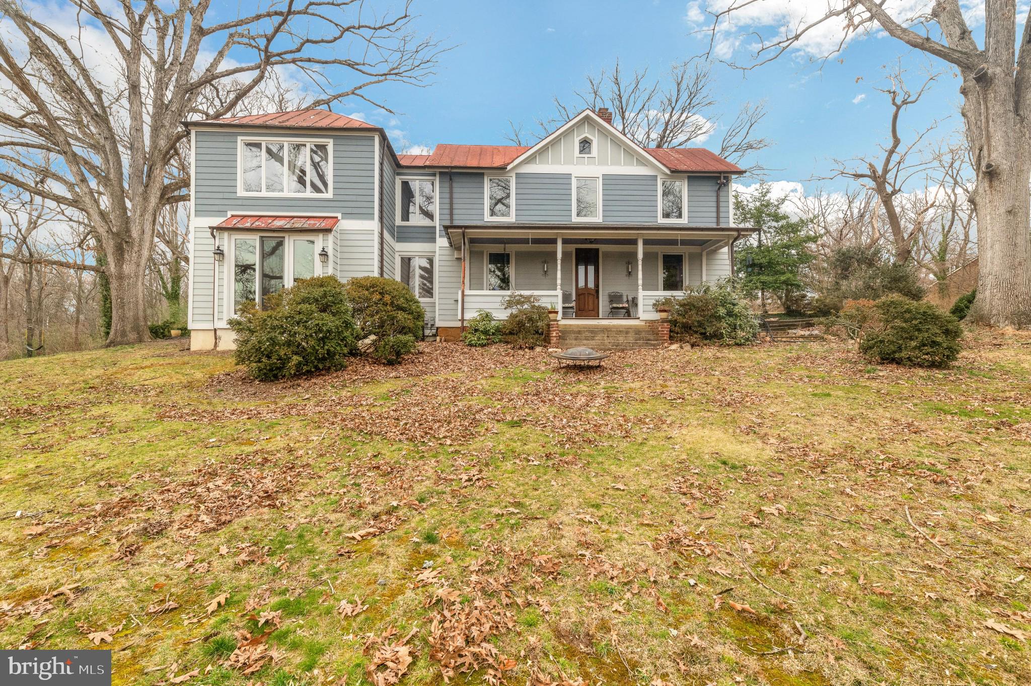 THIS EXTRAORDINARY PROPERTY IS A MUST SEE!! ALMOST 3 ACRES ZONED R-3 (3 DU/AC) INSIDE THE BELTWAY WITH HOLMES RUN STREAM RUNNING THRU IT---- DEVELOPMENT POTENTIAL WITH UTILITIES AT THE STREET...  The original house has been totally remodeled and probably dates back to the late 1800's. This home features the following: gourmet kitchen with custom cabinets, granite countertops, stainless steel appliances, custom woodwork, hardwood and tile floors, wood burning fireplace in family room, large primary suite with designer primary bath, custom closet in primary, new windows and doors, 2 car detached garage, wood shop, AND SO MUCH MORE....