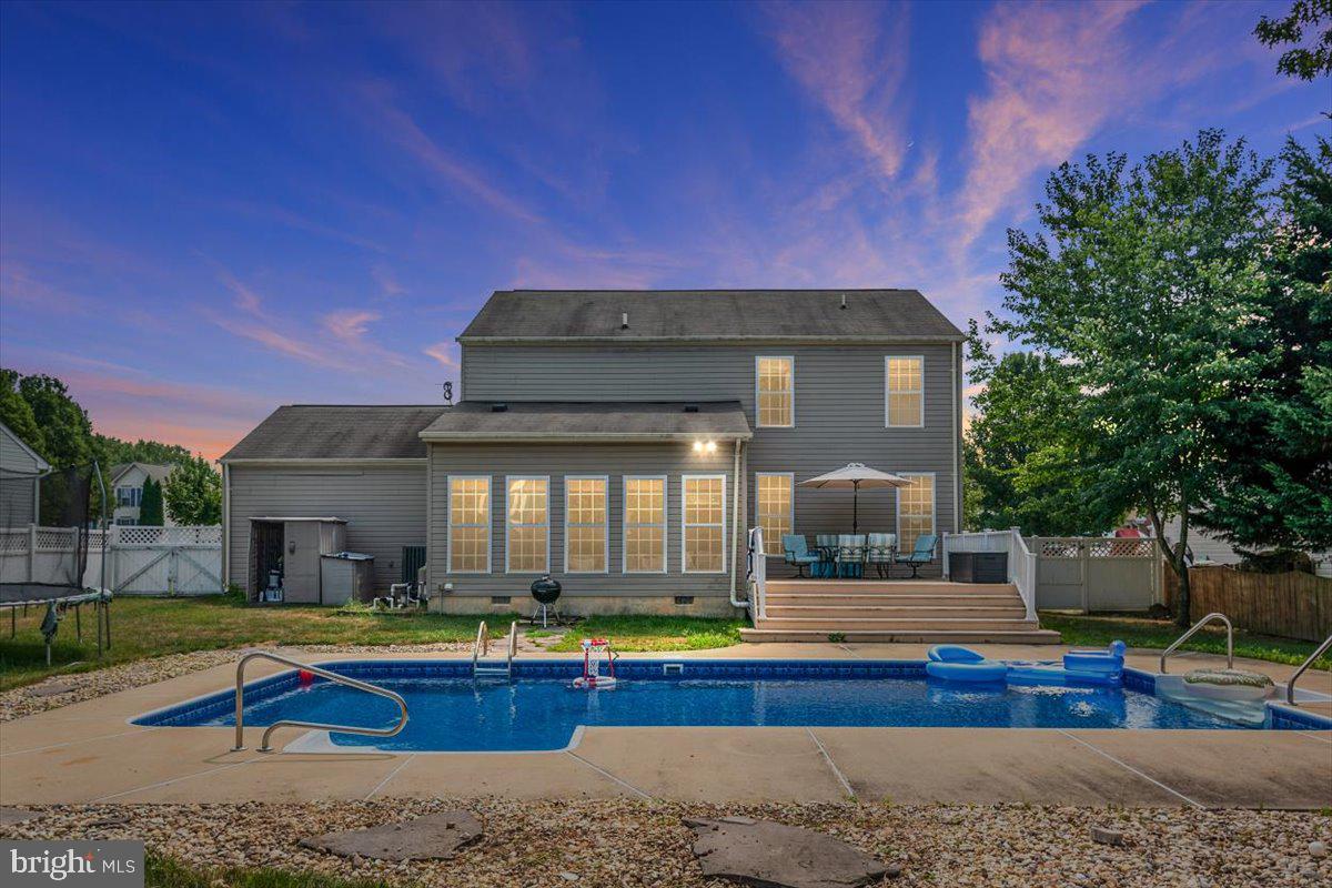 Welcome to 148 Edenderry Ave in the sought after North Brook community.  This home is boasting OVER 2400 sq ft, brand new gorgeous quartz countertops, freshly painted family room, sunroom, and kitchen, and an in-ground pool.  As you walk inside this home, you will notice the open floor plan and freshly painted rooms.  The living room / office is to the left and is large and spacious, the dining room / game room is to the right and as you walk down the hallway you walk into the best part of the home, the kitchen, family room and sunroom.  This is the heart of the home.  The kitchen boasts brand new quartz countertops, large kitchen island, stainless steel appliances, ample counter and cabinet space, and all open to the sunroom and family room. The family room is HUGE and offers a ton of natural light and views of your in-ground pool!  The sunroom is directly off the back of the kitchen and offers an abundance of windows, natural light and more views of your in-ground pool!  Moving upstairs you have 4 LARGE bedrooms and 2 full bathrooms.  Each bedroom is large and all offer great closet space!!  The hallway bathroom boasts an upgraded vanity and tile floor.   Moving into the owner's suite, you have a large bedroom, 2 closets, and custom trim and lighting.  The owner's suite bathroom offers a double vanity, tile floors, and stand up shower.  Heading outback you have your very own oasis.  There is a HUGE deck off of the sunroom that leads down to the in-ground swimming pool and backyard.  The pool has newer equipment and liner and is ready for you to start jumping in and enjoying the last days of summer!!!  The backyard is also fenced in and there's plenty of room beyond the pool to play!  And a HUGE bonus is the custom #storage in the garage!!!  Another bonus, NO HOA!!!  This home is conveniently located to all major routes, beaches, boat ramps, shopping and restaurants.