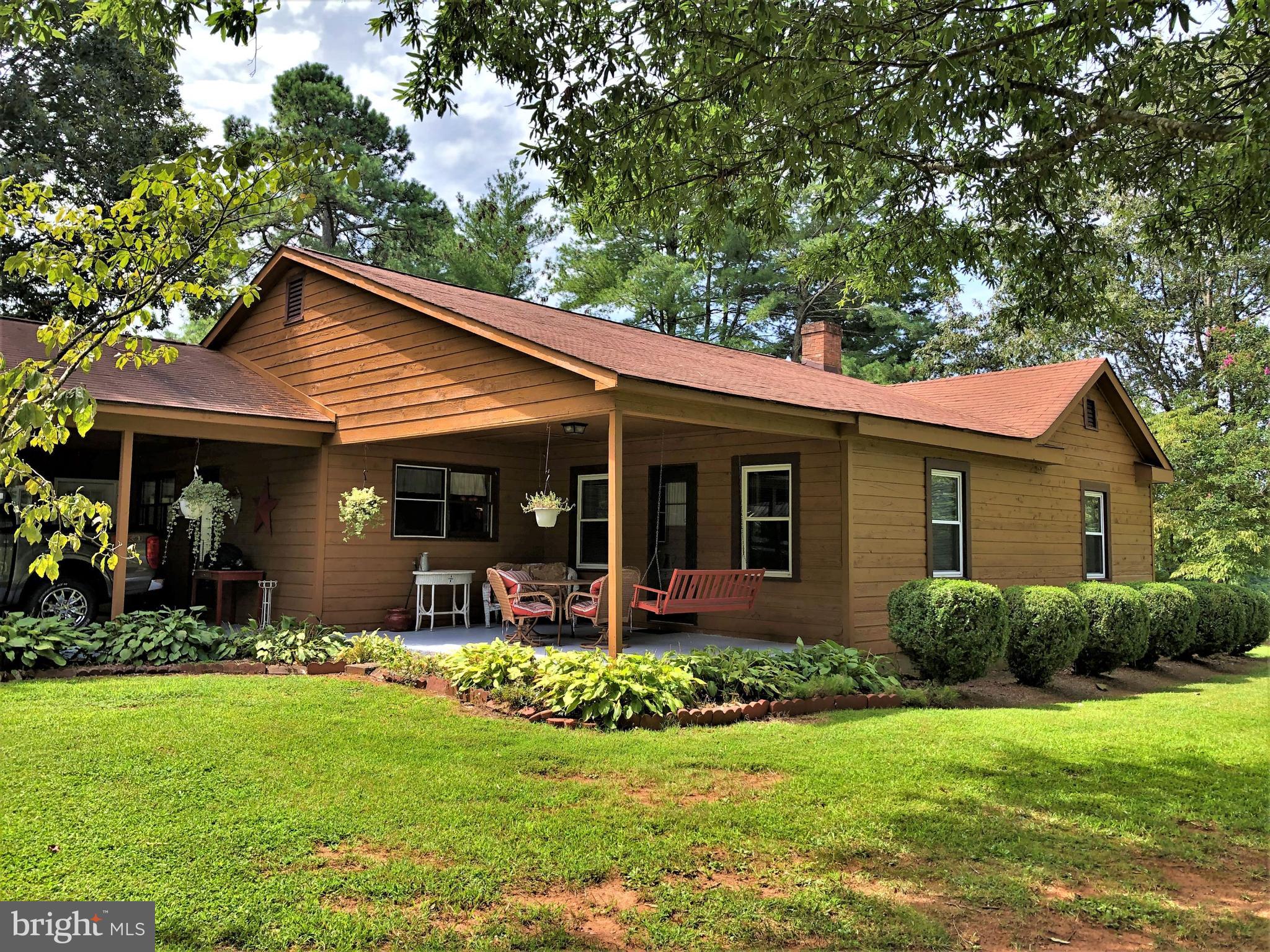 Calm and Peaceful 1548 sq ft. 3 bedroom 1 bathroom farm house on nearly 10 acres! Gorgeous hardwood and mixed pine timberland making for excellent deer and turkey hunting and plenty of open space up front near the house for gardening and mini-farming! And don’t forget the detached 2 car garage with 400sq ft of heated overhead bunkroom space fully equipped with a full bathroom and a mudroom! This property has been in the family for many many years and has tons of hunting, farming, and family memories that are ready to be passed on to the next generation! This home has had several major updates over the past few years and has been given the kid glove treatment. So that means that this gem will be here for many years to come! Excellent starter home opportunity to get back to your roots and raise your family in the great outdoors! Looking for a place to retire? Talk about a  turnkey set up that already has the bunkrooms set up for the kids and grandkids to come visit! And don’t forget about the Garden!! This garden already has a plethora of well established grape vines, fig, plum, and other various fruit trees. The owners of this beautiful home have had successful garden/crop yields for the past several years and the set up is ready for you to take over!
Less then 15 minutes away from the city of Danville VA, you can be at work, or all you shopping needs within a short drive. Pittsylvania County and the city of Danville sit right on the edge of the gorgeous Blue ridge Mountains and you don’t have to go far to get beautiful vistas and tons of local history and attractions! About an hour north to Smith Mountain Lake and just an hour west to Philpott Lake and you can have easy access to excellent fishing and boating! Only an hour and a half north to the city of Lynchburg to watch the Liberty Flames football games! Less than an hour from the Martinsville Motor speedway to the west! If you haven’t already got the picture, there’s plenty to do around here including just sitting in the peace and quiet of the country side!  

This home is being sold As Is and will also include many of the items and furniture seen in the photos and during showings. A detailed list of what the seller will be removing will be included upon contract signing. 
The Seller and agent require a 48 hour advance notice of showings and all financed buyers must have preapproval before a showing may take place. 
Call today for more details!