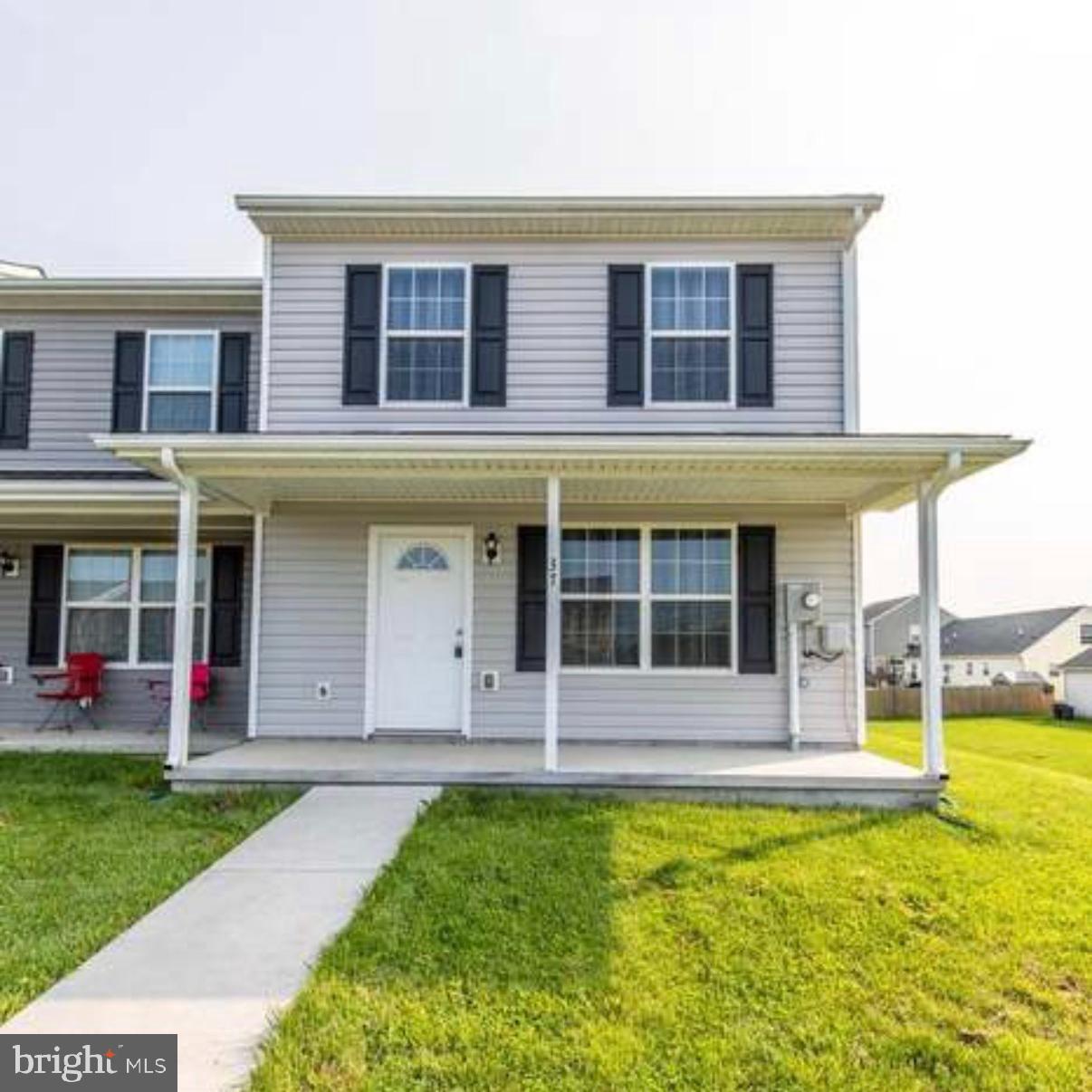 Welcome to this well-maintained two-level end-unit townhome offering 3 bedrooms and 2.5 bathrooms in a desirable Inwood location. Freshly painted with brand-new carpet, this move-in-ready home is ready for its next owner.  
The main level features a spacious living room, an eat-in kitchen with abundant cabinet and countertop space, a large pantry, and a convenient half bath. Upstairs, you'll find three generously sized bedrooms, including a primary suite with a private full bath, an additional full hall bathroom, and a convenient laundry area, making everyday living a breeze.  
Enjoy the added privacy and natural light of this end-unit home, along with a covered front porch that welcomes you home and a rear patio that's perfect for grilling, relaxing, or entertaining family and friends. Conveniently located just minutes from I-81, this home offers an easy commute to Northern Virginia, Maryland, and surrounding areas while being close to shopping, dining, schools, and everyday amenities. Whether you're a first-time homebuyer, looking to downsize, or searching for an investment property, this home is one you won't want to miss. Schedule your private showing today!