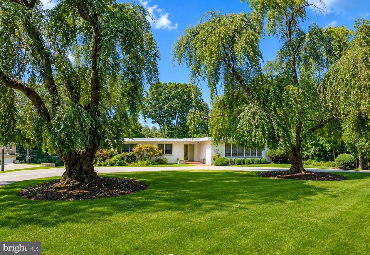 Exceptional opportunity in desirable Derbyshire! This spacious 4 bedroom 3 bath brick rancher sits on a beautifully landscaped 1.13 acre lot and features 2 fireplaces, in ground pool,  private tennis court and additional 2 car garage. A rare combination of space, amenities and location. This home offers the perfect setting for everyday living and entertaining. With great bones and timeless appeal, this amazing home provides the perfect canvas for updating to your personal taste.  Featured as a filming location for the Apple TV series Lady in the Lake, this is truly a one of a kind property! Being sold strictly as is. The lot is .92 acres with a separately deeded .21 acre adjacent lot.