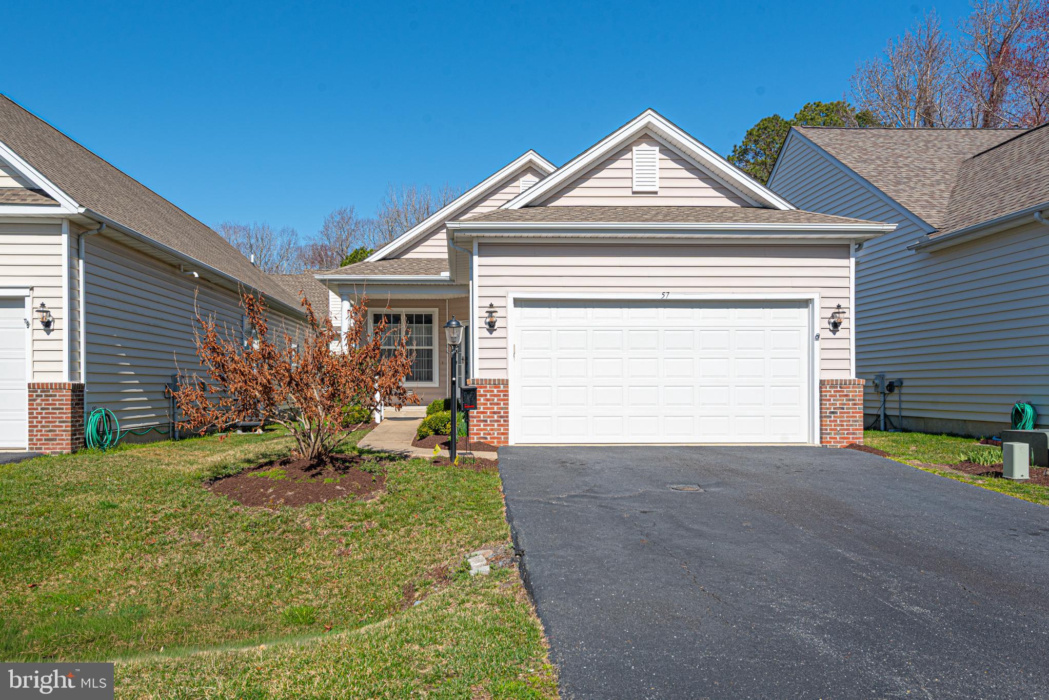 Major Price Adjustment!! Welcome to premier coastal living in this sought-after 55+ community, just minutes from the beautiful beaches of Ocean City. This move-in ready 3-bedroom, 2-bath home delivers the perfect combination of comfort, upgrades, and lifestyle. Step into a bright, open layout featuring new flooring (2017) and a spacious kitchen complete with a center island, large pantry, and updated appliances (2017), plus a brand-new microwave (2025)—ideal for both everyday living and entertaining. The home also boasts a large laundry room with utility tub conveniently located off the garage, adding everyday functionality.
Enjoy peace of mind with major updates already completed, including a new roof (2022) and a Trane heat pump (2017). The primary suite is thoughtfully designed with a newer seated handicap-accessible shower, offering both comfort and accessibility. Relax outdoors in your private front courtyard, perfect for morning coffee or evening unwinding. Additional highlights include window treatments throughout and generous living spaces designed for easy, low-maintenance living. Located within walking distance to the amenity-filled clubhouse and mail pavilion, this home places you at the heart of a vibrant, active community. Call now for your private showing!