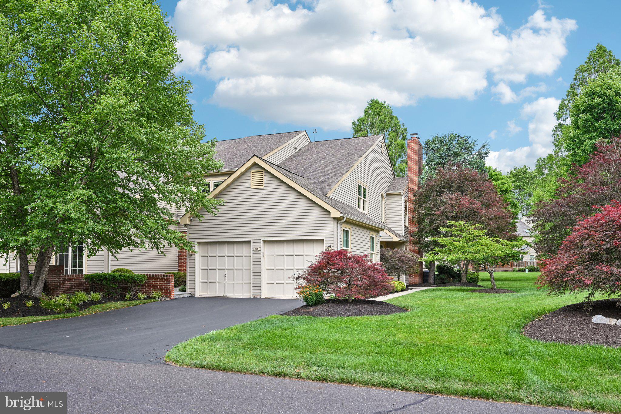 There are homes that impress you the moment you walk through the door. Then there are homes that quietly convince you that you’ve found exactly where you’re meant to be.

Welcome to 175 Hunter Court.

Perfectly positioned in one of the most private settings within the sought-after Gwynedd Hunt community, this exceptional end-unit carriage home offers a lifestyle that’s increasingly hard to find, peaceful, beautifully maintained, and effortlessly connected to everything.

Start your mornings in the charming front courtyard as the sun rises, and end your evenings watching breathtaking sunsets paint the sky. Host family and friends on the expansive, exceptionally private rear patio, where mature landscaping creates the feeling of your own secluded outdoor retreat. Every outdoor space invites you to slow down, gather, and enjoy the moments that matter most.

Inside, timeless design and meticulous care are evident in every room. Beautifully renovated kitchen and bathrooms, custom built-in cabinetry and shelving, elegant window treatments, generous closet space, and a sophisticated neutral palette create a home that feels both refined and welcoming. Two fireplaces, including one in the serene primary suite, bring warmth and character, transforming everyday living into something truly special. A whole-house generator and rare spacious two-car garage add an extra level of comfort and convenience.

One of the greatest luxuries of living in Gwynedd Hunt is the freedom to simply enjoy your home. The professionally managed HOA maintains the beautifully landscaped grounds throughout the community and plans for the future with reserve funding for the roofs, allowing homeowners to embrace a true lock-and-leave lifestyle with confidence.

And then there’s the location.

Imagine strolling to Whole Foods for dinner ingredients, grabbing coffee at Starbucks, or meeting friends at one of the neighborhood restaurants, all just a short walk from your front door. In less than five minutes, you’ll find yourself in the heart of downtown Ambler, one of Montgomery County’s most beloved destinations, filled with boutique shopping, outstanding restaurants, live entertainment, and year-round community events. Commuting is equally effortless, with Routes 309, the Pennsylvania Turnpike, and multiple regional rail stations just minutes away, making this one of the area’s most accessible locations without sacrificing the serenity of home.

Adding even greater confidence to your purchase, this home has already been pre-inspected and includes a one-year home warranty, giving you peace of mind from the very beginning.

Some homes offer beautiful spaces. Others offer an exceptional lifestyle. At 175 Hunter Court, you’ll find both.
(images with furniture are virtually staged)