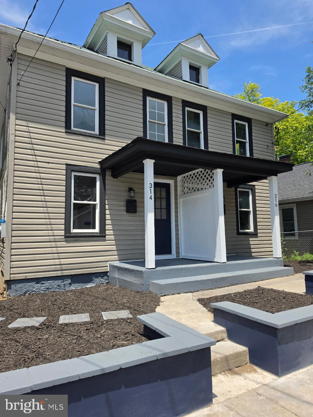 Welcome to this completely renovated 3 bedroom / 2 bath duplex home located near the heart of Martinsburg, WV.    Nearly the entire home has been replaced from top to bottom.  New kitchen, bathrooms, flooring, cabinets, trim, walls, lighting, and so much more!  Also includes all new kitchen appliances, plus a new washing machine and clothes dryer.  Stay comfortable with the single-split HVAC unit.  The unfinished attic space and basement offer endless possibilities, whether you need extra storage space now, or would like to add extra living space at a later time.  The outside has been refreshed with new paint and nice landscaping.  Children and pets will love the fenced-in back yard.  This is a great value for a 3-bedroom home, so schedule a showing today!