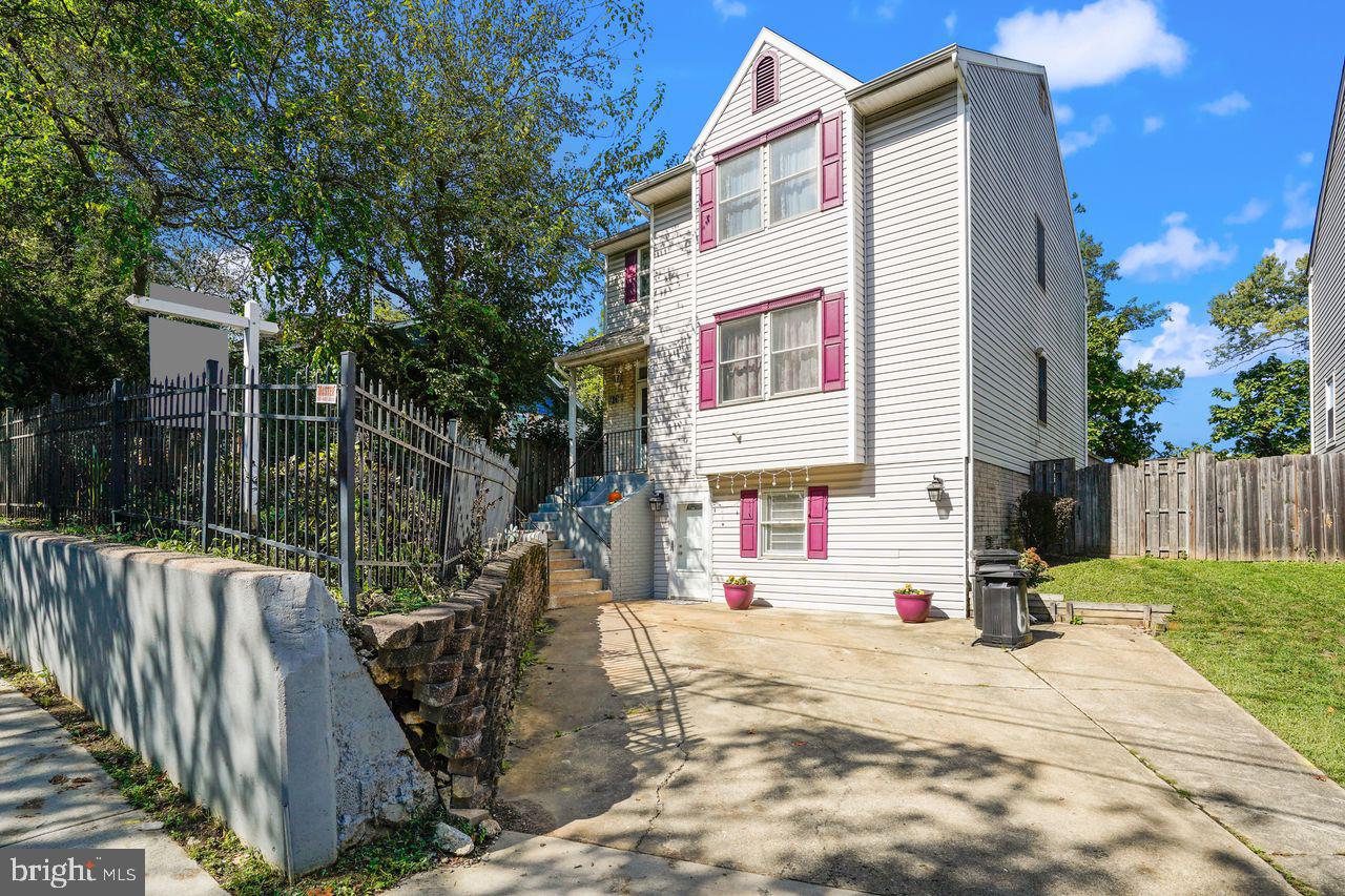RECENT PRICE IMPROVEMENT!  Welcome to this Contemporary beauty in sought-after Takoma Park.  This spacious home features approximately 3,290 square feet of finished living space with four bedrooms and three and a half bathrooms on three levels.  The primary bedroom on the upper level has a full bathroom and a walk-in closet, and there are three additional sizeable bedrooms on that floor.  The home's kitchen is equipped with quartz countertops, maple cabinets, a wall oven and a 5-burner gas cook top in the center island.  A kitchen bay window has a view of the rear deck and back yard. The kitchen overlooks a cozy family room, with glass doors to the generous deck and the large, flat, fenced back yard that offers a storage shed, a patio and garden beds for flowers and vegetables.  The home has 9-foot ceilings, hardwood floors (oak and Brazilian cherry wood), chair and crown moldings, and a first-floor laundry closet and half-bathroom.  
Additionally, the home has a separate in-law suite that offers additional bedroom options, a full bathroom, and a kitchenette.  The home is heated by a 2-zone gas system and has central air conditioning. This home blends comfort and convenience in a quiet setting. The neighborhood has a community garden and children's play lot, is one mile to the Takoma Metro Station, and is a short commute to restaurants, shops and entertainment in downtown Takoma Park, Silver Spring and DC.  A home warranty is being offered by the Seller.  There is a lot to see here.  Welcome Home!!