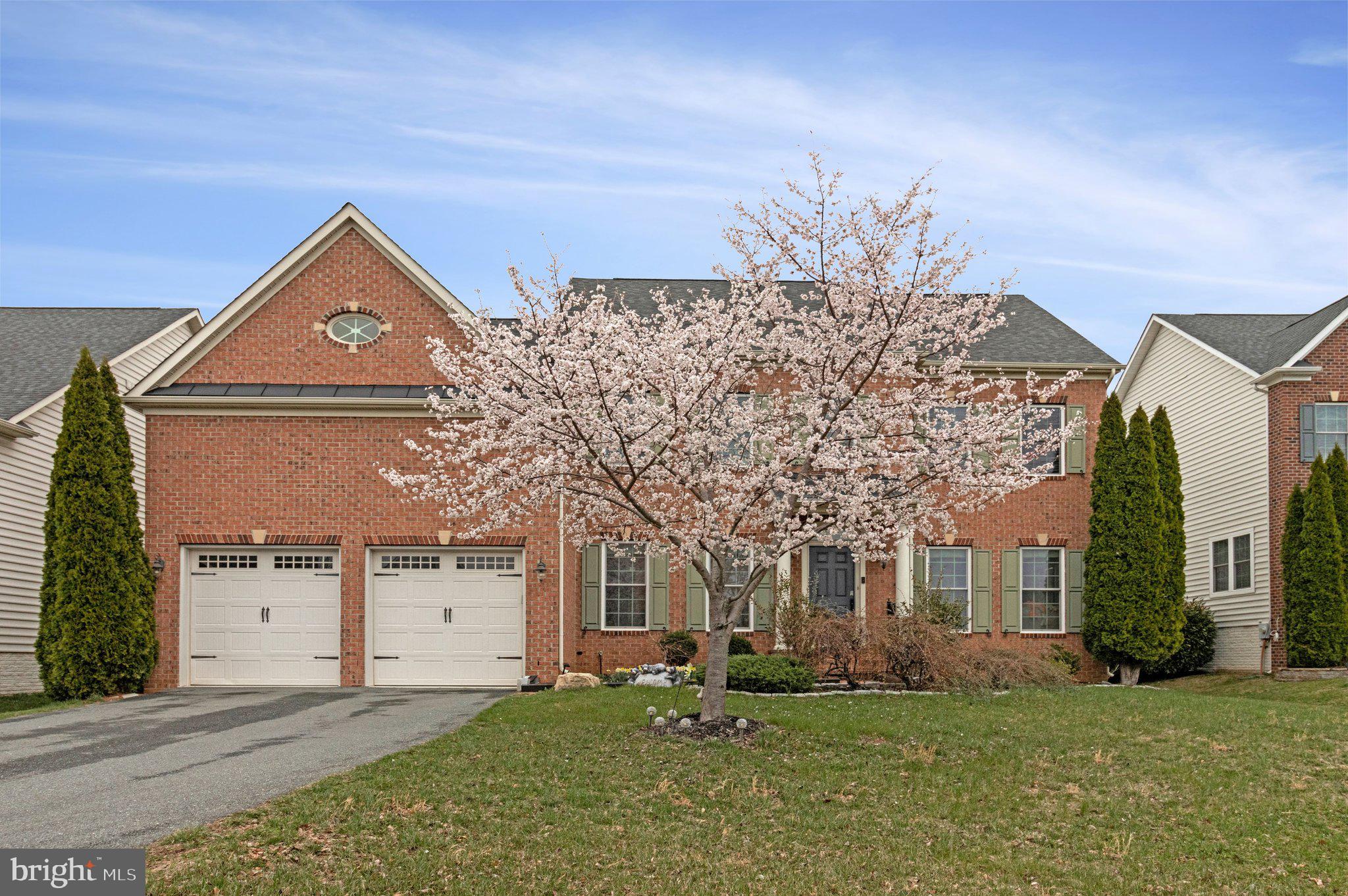 Gorgeous 4 bed, 4 full bath, 1 half bath, 2 story family room & foyer, huge patio, 6000 + square foot home in the coveted Clarksburg Village subdivision.  Entire home, freshly painted. Gourmet kitchen with Stainless Steel appliances, mostly new, with granite countertops, connects to a large breakfast area that walks out to a custom made 38' x 16' patio.  The patio has pretty pavers on top of a thick concrete layer, and has a round decorative section as well as a firepit.  A formal dining room and living room greet you when you enter the foyer.  In addition, the main floor has an office as well as a huge 19' x 19' 2 story great room.  Most of the main level has hardwood floors.  2 story foyer, 2 story great room with a gas fireplace, and lots of windows on all sides means you have a home that gets plenty of sunshine.  Upper floor has 4 bedrooms and 3 full baths.  Master bedroom has a sitting room, its own balcony, 2 walk in closets, a large tub, a walk in shower with 2 showerheads, and a hidden water closet. The walk up lower level has a gigantic 37' x 24' recreation room that has custom made wall of shelves, 2 large storage areas, and a full bath.  This is a home where your family can enjoy lots of space both inside and outside the home, and make memories that will last forever!