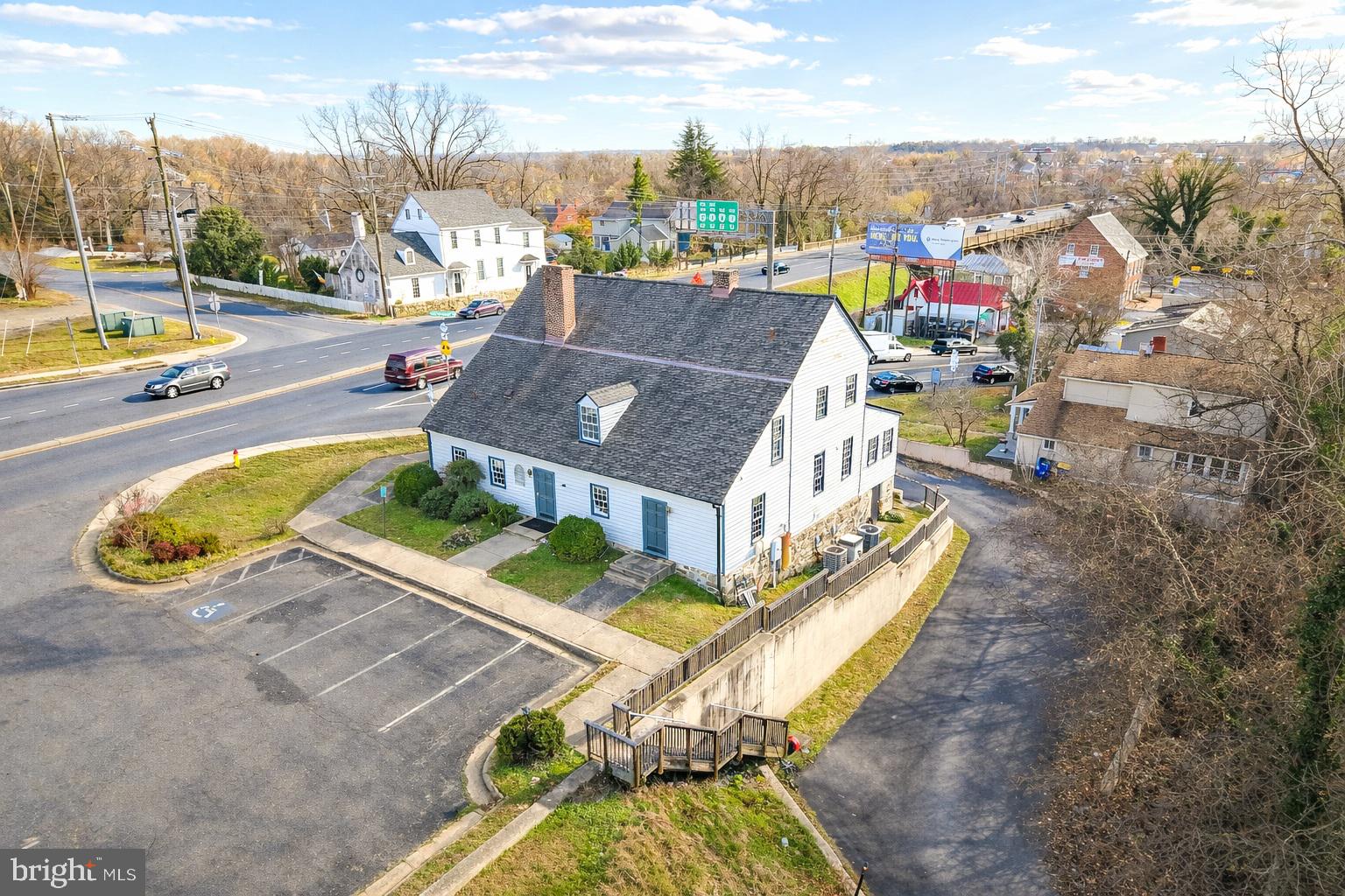 Don't miss your chance to own a piece of Colonial History! Pre-Revolutionary War era notoriety meets unfathomable road frontage and visibility in this rare opportunity.  Originally a cotton warehouse, the original building was constructed in 1757 for Bazil Gorden, who would go on to become the very first millionaire in Virginia. Take a tour and you'll notice areas of the original brick and mortar walls, original glass, and Colonial era beams and supports. Your business deserves a building that makes a statement without you having to utter a word. More than that, it deserves to be seen. 

Zoned B2 and sitting on a total of 1.4+/- acres, this property is located at the intersection of Route 1 and 17. For those who aren't already aware, Route 1 cuts through Spotsylvania, Fredericksburg, and Stafford, and functions as a parallel alternative to I-95. Route 17 provides local access to I-95, Warranten, Culpeper, and the Northern Neck.

The upper parking lot provides 10 parking spaces, however, the sizable lower lot could easily accommodate 50+ vehicles, with potential for more with minimal development. While previously an office building, this property has potential for so many fantastic uses. Please see the Floor Plans included in the photo album for current layout as well as square footage