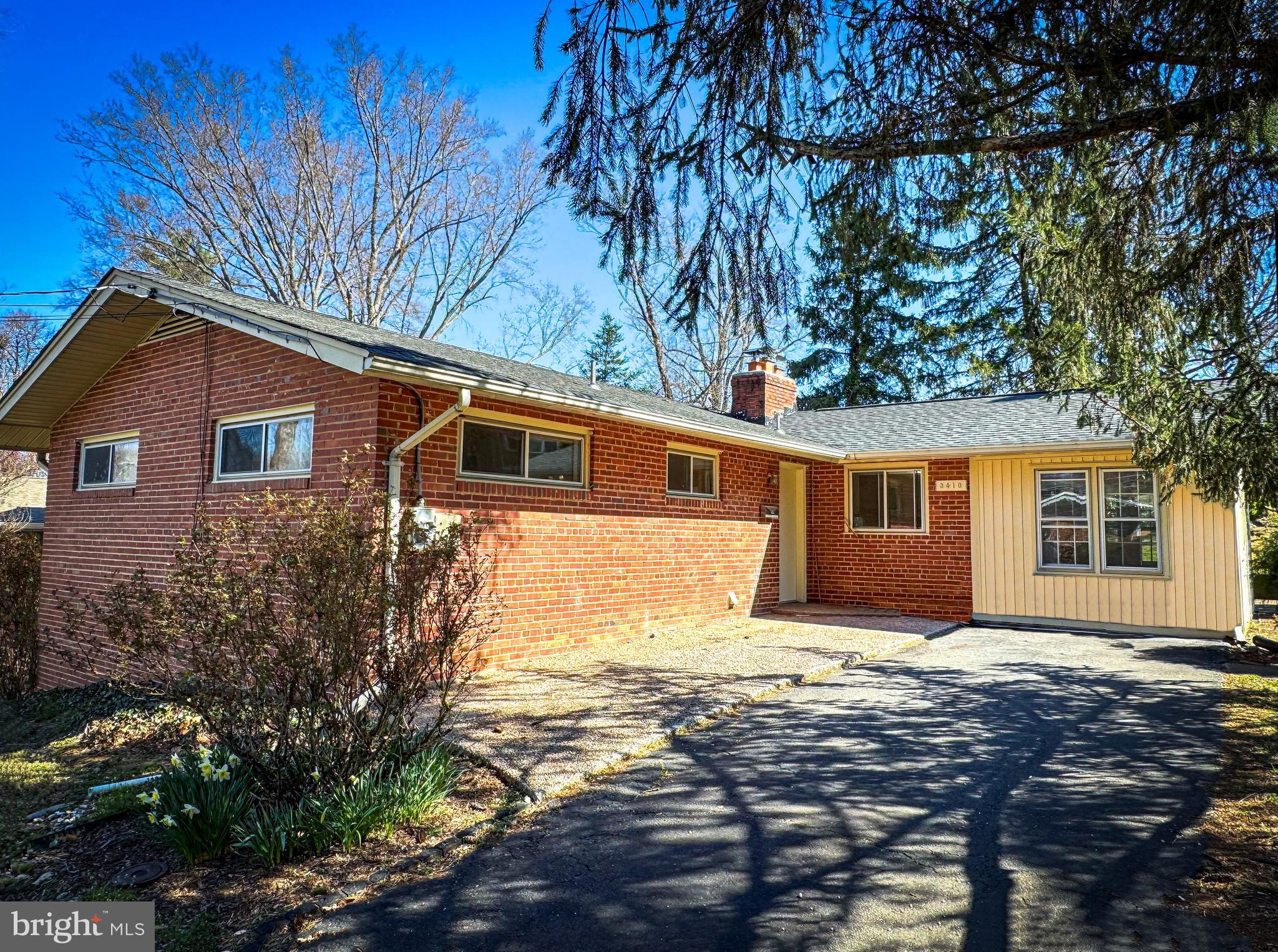 NEWLY RENOVATED THROUGHOUT- MOVE IN READY!  PRICE SLASHED $30K - Don't miss out! Brick front rambler with 4BR, 2 full baths, finished walkout basement and cozy sunroom addition. Open floorplan  with lots of windows and light. Freshly painted throughout. Gleaming Hardwood floors main level. New LVP flooring on the lower level. All baths remodeled.
Cozy brick Fireplace in FR.  Brand new kitchen includes quartz counters, stainless steel appliances, tile backsplash and white cabinetry. Fully finished lower level with 4th Bedroom, full bath, 2nd fireplace and convenient walkout door to beautiful yard and patio. Super convenient to shopping, metro, dining, great schools, and i66 and routes 50. Amazing location, friendly neighborhood and main level bedroom. Hurry!