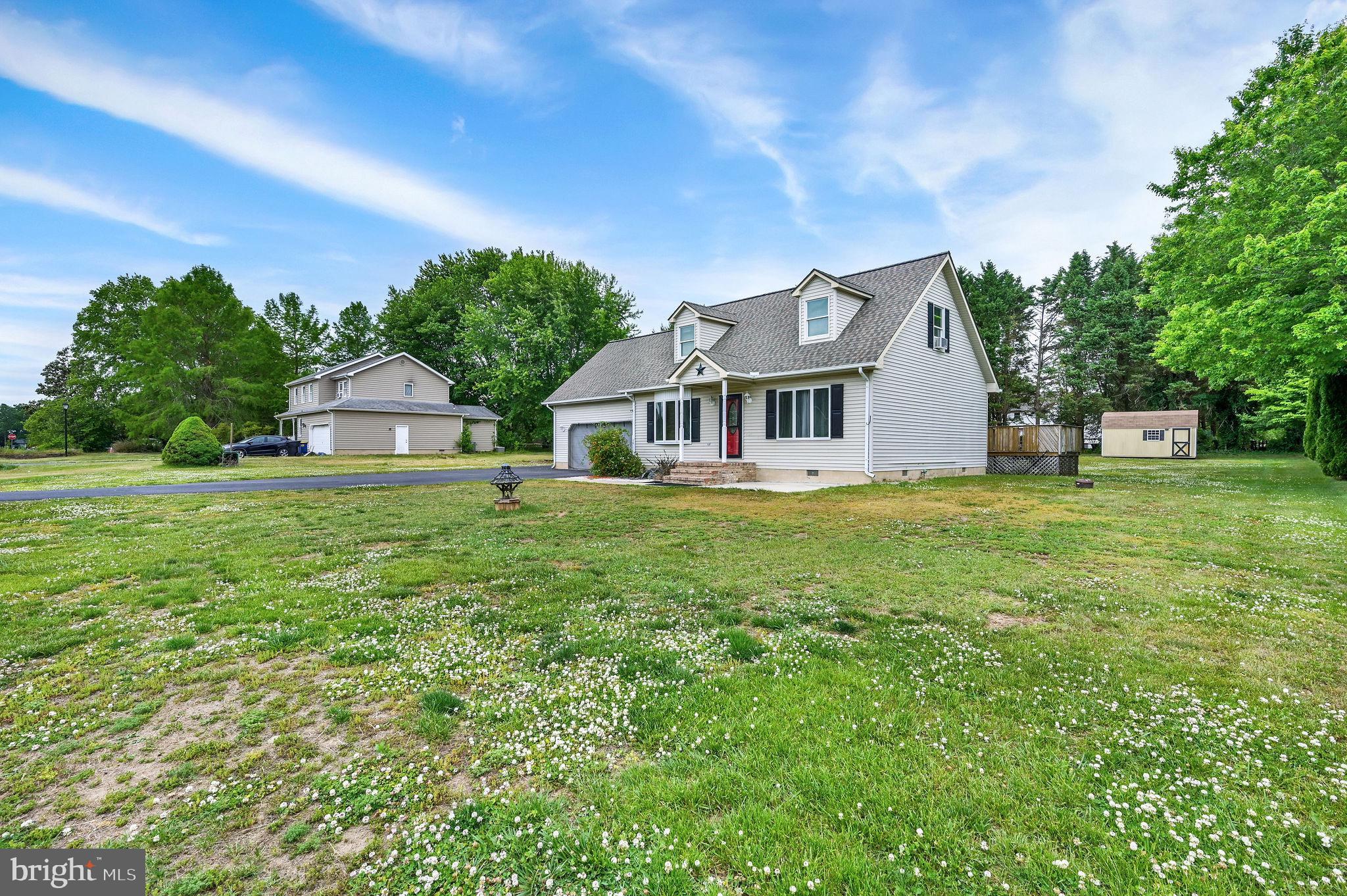 This charming Cape Cod offers a functional layout, thoughtful updates, and flexible living space in a convenient location just outside of Dover. Tucked away from the hustle and bustle while still providing easy access to shopping, dining, and everyday conveniences, this home combines comfort and practicality.
Step through the front door into a spacious living room flowing seamlessly into the dining area and kitchen. The kitchen offers plenty of Amish-built cabinetry and counter space, a large pantry for additional storage, plus a newer sink and dishwasher installed within the last year. The generously sized dining area includes a sliding glass door leading out to the deck and backyard, creating an ideal setup for everyday living and entertaining. Additional storage can be found in the closet tucked beneath the staircase. The first-floor primary suite provides convenience and privacy with an attached full bathroom featuring a double vanity, tub/shower combination, and two closets. A half bathroom and first-floor laundry add even more everyday functionality. Upstairs, you’ll find two well-sized bedrooms along with a massive bonus room offering endless possibilities for additional living space, a game room, home office, playroom, or whatever best fits your needs. With comfortable living spaces, recent updates, and a location that offers both peace and convenience, this home is ready for its next owner to move in and make it their own. Schedule your private tour today!