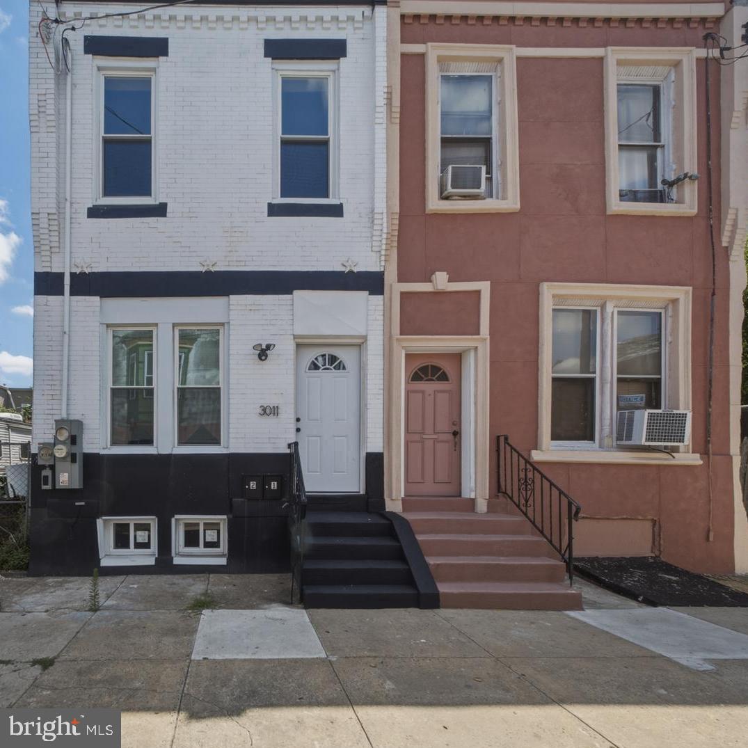Whether you are a first-time homebuyer seeking to generate rental income while living in one unit or an experienced investor expanding your portfolio, this fully renovated duplex is a turnkey opportunity. Each unit offers 2 bedrooms, 1 full bath, and modern finishes throughout. The open-concept living and dining areas feature recessed lighting, ceiling fans, and oak-tone luxury vinyl plank flooring. Each kitchen is beautifully designed with white shaker cabinetry, black hardware, designer backsplash, and stainless steel appliances, including a refrigerator, dishwasher, built-in microwave, and electric range. The stylish bathrooms showcase a timeless black-and-white design with porcelain tile, black hexagon tile flooring, matte black fixtures, a rain shower head over the tub, and black shaker vanities. Both units include electric baseboard heat. The first-floor unit offers access to a spacious basement with approximately 9-foot ceilings, providing ample storage. The second bedroom opens to a private, fenced backyard featuring a newly poured concrete walkway, grassy area, and space for outdoor entertaining or gardening. The second-floor unit mirrors the same quality finishes and includes convenient washer and dryer hookups.
Conveniently located less than 2 miles from Temple University and Temple University Hospital, with easy access to Broad Street, public transportation, shopping, and dining. Ideal for owner-occupants or investors seeking rental income. Eligible first-time buyers may qualify for programs such as Philly First Home or PHFA K-FIT to assist with down payment and closing costs. Schedule your showing today and see the value this move-in-ready duplex has to offer!