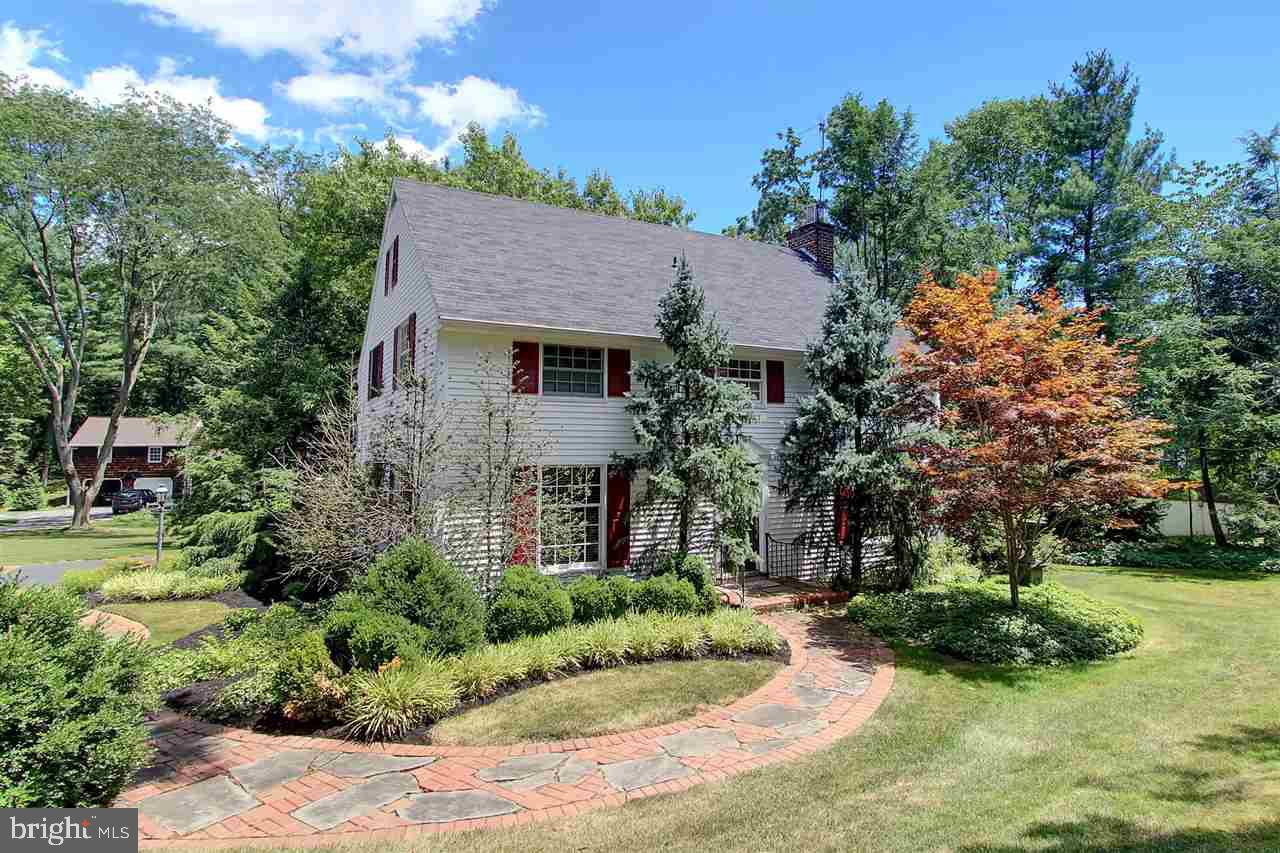 Charming home with tons of character.  Beautiful setting and location are found with this lovely home. New furnace 2016. Hardwood floors throughout 1st and 2nd floors.  Magnificent landscaping with terraced gardens and multiple deck levels. Gazebo with electric service. Two large black exterior urns purchased in Vermont and shipped to home, convey.  Home is priced to sell taking into account potential updates. Whole house generator included.