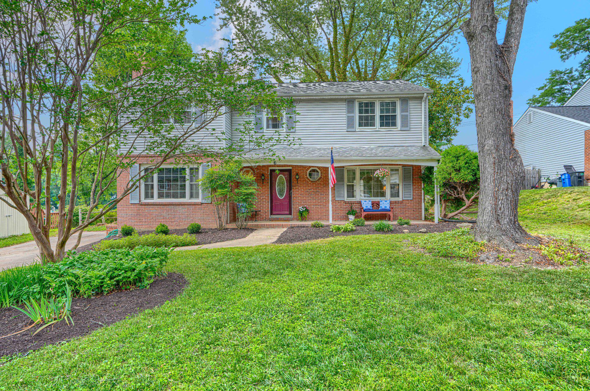 Welcome home to this beautiful and spacious brick-front Colonial nestled on a quiet court in the desirable Springdale community. Situated on a picturesque .20-acre lot, this charming 4-bedroom, 2 full-bath and half-bath home offers timeless appeal, thoughtful updates, and plenty of space for everyday living and entertaining.

Recent improvements include updated bathrooms and kitchen with quartz counters, new appliances, new carpeting, some new flooring, and fresh paint throughout. Gorgeous and gleaming hardwood floors flow throughout much of the home, adding warmth and character.

The inviting family room features exposed beam ceilings and a wood-burning fireplace, creating the perfect setting for cozy evenings. The bright and airy eat-in kitchen with brand new quartz counters offers a lovely view of the backyard, while the formal dining room provides ample space for hosting memorable dinner parties. A generously sized living room is ideal for large gatherings and features elegant French doors leading to the backyard. Each of the upper level bedrooms have ample space and Primary Suite is truly a suite, with plenty of room for a King sized bed and a sitting area with a great sized walk-in closet!

Built in 1968, this well-maintained home offers peace of mind with a roof and gutter guards installed in 2015, along with several replacement windows completed the same year. The unfinished basement provides abundant storage and endless possibilities for future expansion, recreation space, or a workshop.

Springdale residents enjoy a voluntary community association featuring a neighborhood pool and a variety of family-friendly activities. Surrounded by mature trees and abundant wildlife, this established community is known for its welcoming atmosphere and highly rated schools. Conveniently located close to shopping, dining, parks, and commuter routes, this home truly offers the perfect blend of tranquility and convenience.