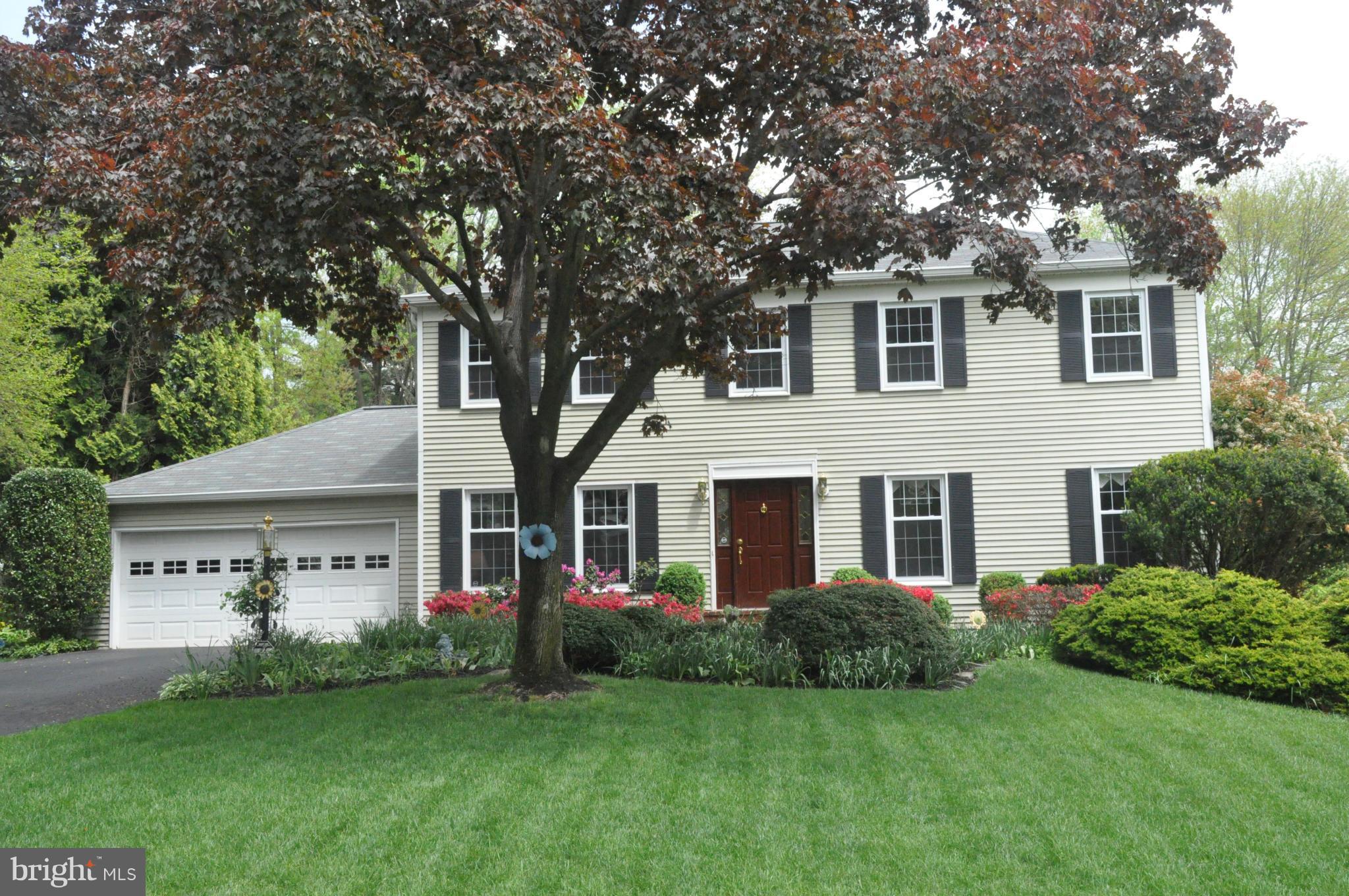Stonegate colonial on private fenced lot. Home features updated kitchen, large dining room, living room, study, and large addition with stone gas fireplace and windows looking out to professionally landscaped yard, large composite deck and hot tub. 5 good sized bedrooms on 2nd level w/2 full baths.  Finished basement w/work shop and plenty of storage. Two car garage. This home shows like a model.