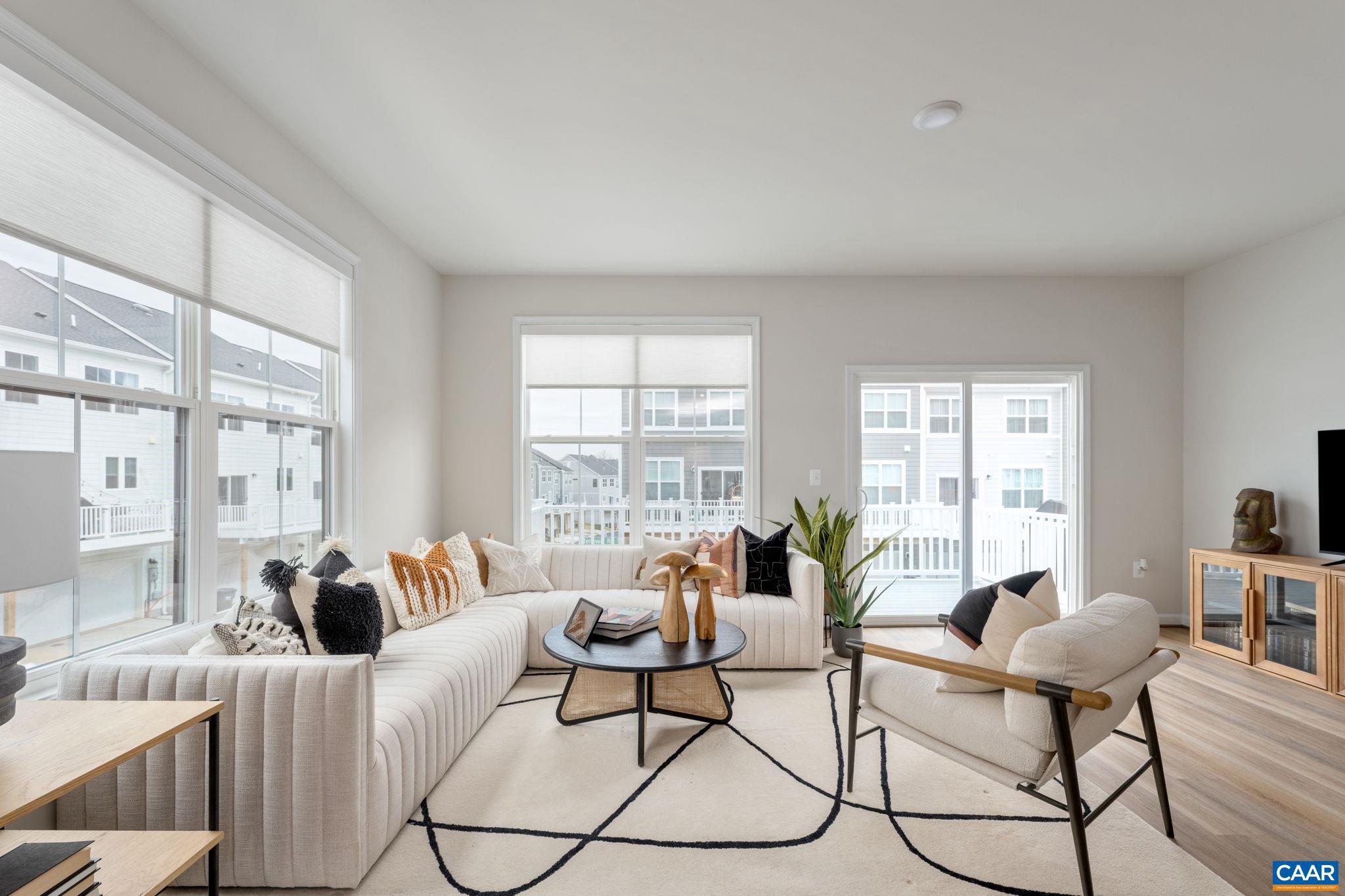 Oct/Nov Move-In ? New Ashton End Townhome at Southwood!  This beautifully designed Ashton end townhome offers 1,894 sq. ft., 4 bedrooms, 3.5 baths, and a 2-car garage.  The open layout features LVP flooring throughout the main living areas and a modern kitchen with a large island, granite countertops, and stainless steel appliances. Enjoy outdoor living on the 8' x 18' rear deck, plus stylish finishes throughout with the Banner Collection interior package.  Visit the decorated model home to explore the community and learn more about available townhomes?schedule your tour today!