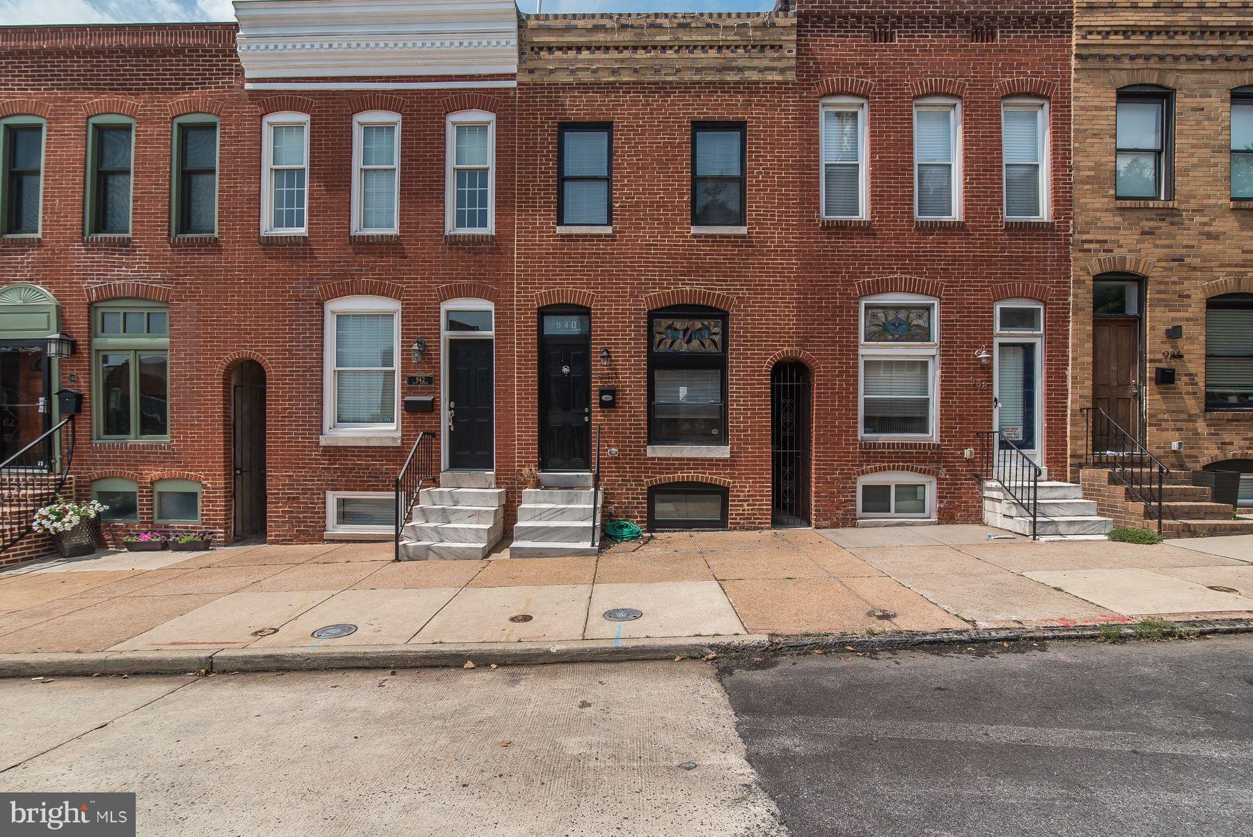 Shows like a model! This bright & beautiful Canton home is a 2015 full reno. *7.5 YRS remaining on CHAP TAX CREDIT!* Stunning Kit feat Quartz counters, geometric bksplsh & ss applcs. Hrdwd flrs on Main & Upper lvls. Each BR has its own Bath! Impressive finishes incld coffered & tray ceilings, designer color scheme & custom tile work. Roof deck w/ views of water & Mr. Boh; Prkg pad for compact car.
