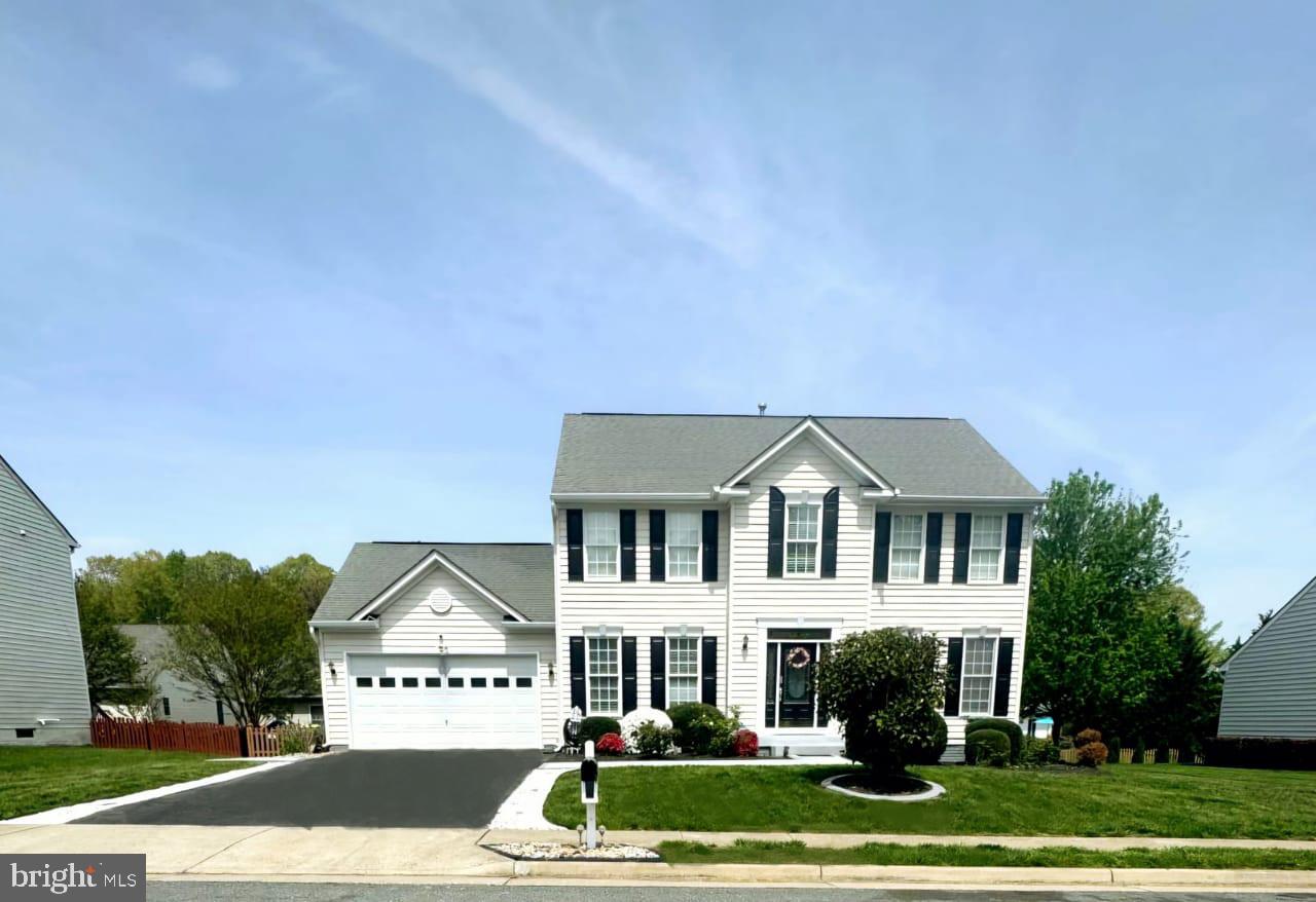 Welcome to your New Home at 6805 Castleton Dr. This five-bedroom, three-and-a-half-bathroom Colonial invites you into a world of elegance, with a beautiful  interior that offers both comfort and style. The traditional Colonial exterior, creates a timeless curb appeal. The dining room mimics these windows, providing a sunny setting for weekend brunches. Formal living room on the main floor or it can be your Home office plus a Family room on the main floor. Step outside the family room to the beautiful patio with cooktop, grill, wet bar, etc. The heart of the home, a gourmet kitchen with granite countertops, stainless steel appliances and the island making it perfect for culinary enthusiasts and entertainers alike Upstairs, Master bedroom, Master bathroom with walking closet, 3 large bedrooms with a common full bathroom. The home's fully finished walkup basement is a true bonus, offering a separate living space complete with a recreation room with wet bar, 5th bedroom, den appropriate for an office, and a full bathroom. This beautiful home is in MOVE-IN Condition and is in a great location - close to schools, shopping, etc. Opportunities like this don't come around often - schedule your appointment today to experience the warmth and charm of this exceptional home!