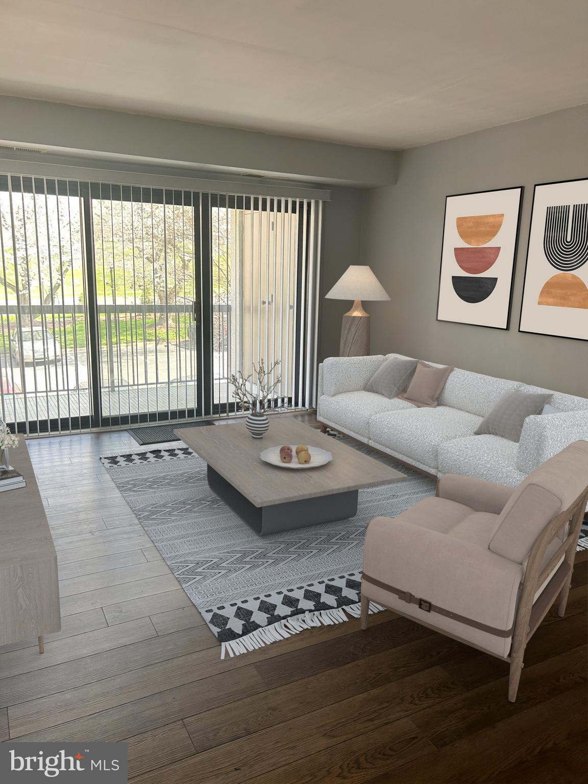 Welcome to this comfortable and functional living condo that is perfectly located in the Twinbrook Parkway area.  Enjoy easy access to local amenities and public transportation in the heart of Montgomery County. Upon entering the foyer, a long hallway offers plenty of storage space in the two entry closets, the larger one includes shelving. The entry hallway leads into a large living room; to the right is an area that can be adapted into a dining area or a study.  The large living room has abundant natural light thanks to its wall-to-wall sliding glass doors. The sliding glass door opens onto a large balcony that can become an oasis for enjoying morning lattes or relaxing with a cold brew at the end of the day.  The large eat in kitchen has plenty of cabinetry and is accessible from the hallway and the dining room. The dedicated dining room can also be adapted as a studio, playroom, game room, or hobby space; the floor plan is so versatile that you can play with the space.  See photos that have been virtually staged to show combinations. Upgraded new quality flooring and new 6 panel doors gives the space an almost new vibe. One of the best conveniences is an in-unit washer & dryer in the roomy bathroom.  The Low condo fee includes the pool, trash and water. Very convenient parking is right in front and visitor parking is available in the back.