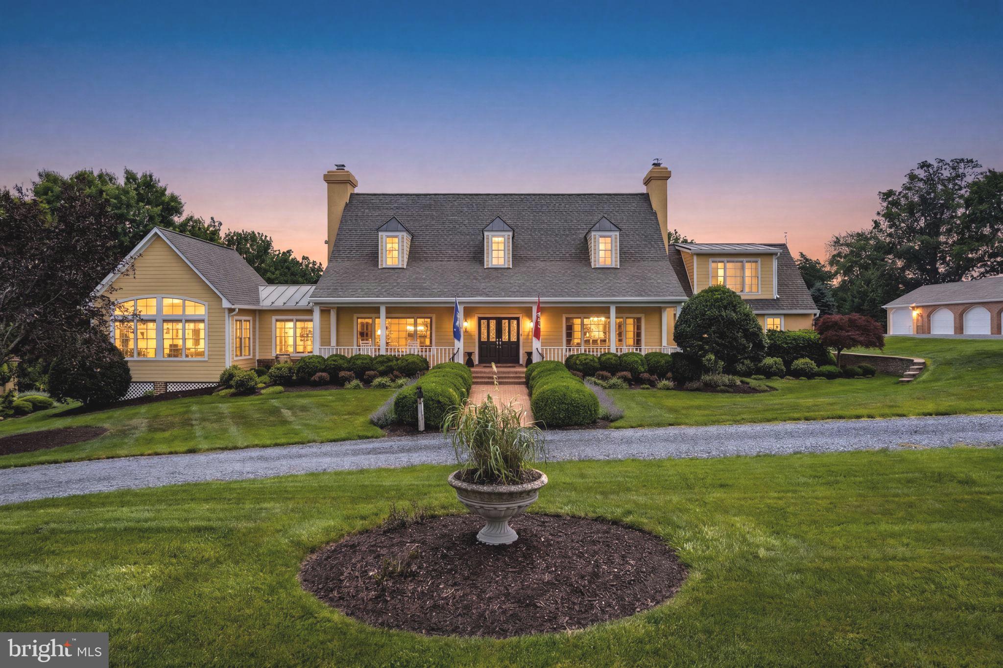 Mountain Shadow Farm, 56 acres of mostly -open, rolling Virginia countryside, in a much-favored part of the fabled foxhunting country.  Long road frontage, a pond, and mountain views set this property apart.  Proceeding up the long drive, one enjoys open views of the farm on both sides before entering the very private gardens and grounds and superb setting of the American-style colonial.  This home features reclaimed, heart pine 5” plank floors, a first floor primary bedroom with very large closet and bath and three additional bedrooms upstairs each with private bath.  The Viking and Subzero kitchen has ample breakfast space, a center island and a fireplace.  Across the lengthy reception hall is an oversized formal dining room with fireplace and a convenient bar area with mini refrigerator and sink.  There is an all-purpose area for casual dining with a brick floor.  Next, one finds the multi-windowed living room with bookshelves, a fireplace, and intimate views of the gardens and farm.  At the other end of the home, down a brick-floored gallery is the family gathering room with a cathedral ceiling and massive stone fireplace.  Next to the family room is a small den.  The lower level offers much storage, a full bath and home gym.  Off the primary bedroom, gallery, and family room find a courtyard that leads to endless outdoor fun.  The 20x40 heated pool includes a heated spa with waterfall into the pool, a Baja shelf for casual enjoyment in the water and a swimming lane.  The pool has an automatic cover and large “patio and garden surround” and most of the pool furniture including a built-in grill conveys.  For ultimate comfort the home offers four HVAC zones including gas and heat pumps and five thermostats,  four fireplaces and two tankless hot water heaters.  There is a generator, two 500 gallon propane tanks – one owned, also a 4 car garage.  Please verify dimensions and square footage.  Internet is Blaze Broadband and Starlink in the area.