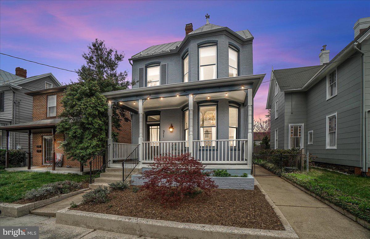 **Offer deadline Wednesday 4/9 by 5:00 PM

Welcome to Third Street ..One of Downtown Frederick’s Most desirable Locations!

This stunning Victorian 3-bedroom, 2.5-bath home boasts rare off-street parking for three vehicles plus non-metered street parking, a true luxury in downtown living!

Inside, you'll find gorgeous original hardwood floors, dual staircases, intricate architectural details, and neutral paint throughout. The main level showcases charming original pocket doors, a cozy gas-insert fireplace, and a bright, airy kitchen complete with a built-in pantry, custom range hood, and stainless steel appliances. Just off the kitchen, lush, mature gardens are beginning to bloom, leading to a private, fenced-in backyard with stately pavers and beautifully landscaped greenery..your own outdoor oasis!

Upstairs, all three bedrooms are conveniently located on one level (with the library functioning as the third bedroom). The updated full bath exudes character with a clawfoot soaking tub and exposed brick walls.

Recent updates include: fresh exterior paint, new gutters, upgraded main-level full bathroom, hot water heater (2021).

The serene balcony offers picturesque views of mature trees and a neighboring pond. The unfinished basement provides ample storage with both interior access and walk-up stairs to the backyard and utility sink, offering great potential for future finishing if desired.

Perfectly situated in the heart of Frederick, this home provides the ideal balance of tranquility and convenience. Enjoy a short stroll to Carroll Creek’s seasonal displays, the farmers market, summer concerts, restaurants, coffee shops, and Baker Park and so much more. With easy access to commuter routes, the MARC train, D.C., Baltimore, and Virginia.

 Don't miss this rare opportunity to own a piece of historic downtown Frederick!

 Schedule your tour today!