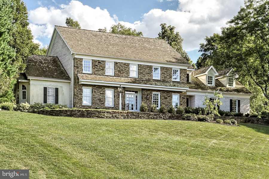 Quality craftsmanship defines this stunning Stone/Brick home with commanding views in Deer Chase Estates. Professionally custom re-designed, every detail carefully selected, quality crafted to incorporate warmth & sophistication with a one-of-a-kind plan.  Fml LR & DR, 2 story Great Room w/grand Fireplace. 1st Flr Mstr Ste w/masterpiece spa bath. Showcase Kitch w/stone-walled back staircase. 2nd Level generous BRs, private baths. Guest House.