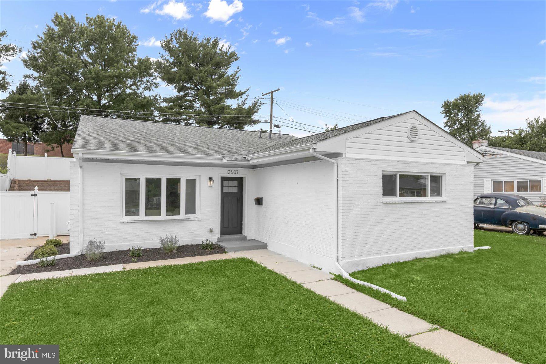 Welcome to your beautifully renovated dream home in Parkville! This spacious 4-bedroom, 3-bath home welcomes you into a bright, open space with a living room that flows seamlessly into the dining area, and gorgeous kitchen. The kitchen is the centerpiece of the home, featuring quartz countertops, a waterfall breakfast bar, premium stainless steel appliances, and custom cabinetry with designer finishes. The main level also features four large bedrooms and three beautifully renovated full bathrooms. Enjoy outdoor living with a back patio, fenced in backyard, and private driveway. With thoughtful updates throughout, this home is truly move-in ready. Conveniently located with easy access to major commuter routes, shopping, and dining. Schedule your showing today!