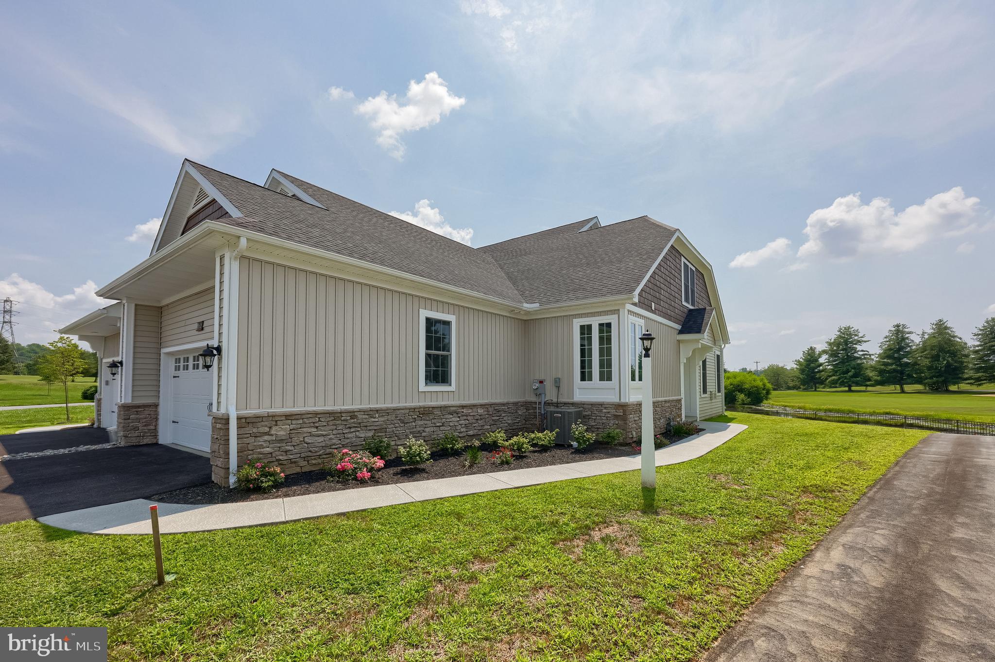Construction is Complete!!  Welcome to effortless living in the desirable Sawgrass section of Crossgates, nestled in the heart of Millersville, PA. This beautifully designed Nelson Model  3-bedroom, 2.5-bathroom semi-detached home offers the perfect blend of comfort, elegance, and convenience—ideal for downsizers, empty nesters, or those seeking a low-maintenance lifestyle. 

Enjoy main-floor living at its finest with a spacious primary suite, featuring a luxurious en-suite bathroom with a ceramic tile shower, quartz countertops, and tile flooring. The open-concept great room boasts a cozy gas fireplace, while the gourmet kitchen showcases stainless steel appliances, quartz countertops, a ceramic tile backsplash, and gas cooking—perfect for entertaining or preparing your favorite meals. 

Upstairs, two additional bedrooms and a full bath provide space for guests or hobbies. Need extra storage? The full basement and upper attic space offer plenty of room, with potential to expand into additional bedrooms or a bath. Luxury vinyl plank flooring throughout the main living areas ensures durability and style. 

Step outside to your private patio, where you can sip your morning coffee while taking in serene views of the pond and Crossgates Golf Course. Whether you're enjoying the scenery or exploring the walking paths, ball field, or tennis courts within the community, every day feels like a retreat. 

Best of all, the HOA takes care of snow removal and lawn maintenance, allowing you to focus on what matters most—enjoying life! Don’t miss this rare opportunity to own a stunning home in one of Millersville’s most sought-after neighborhoods.