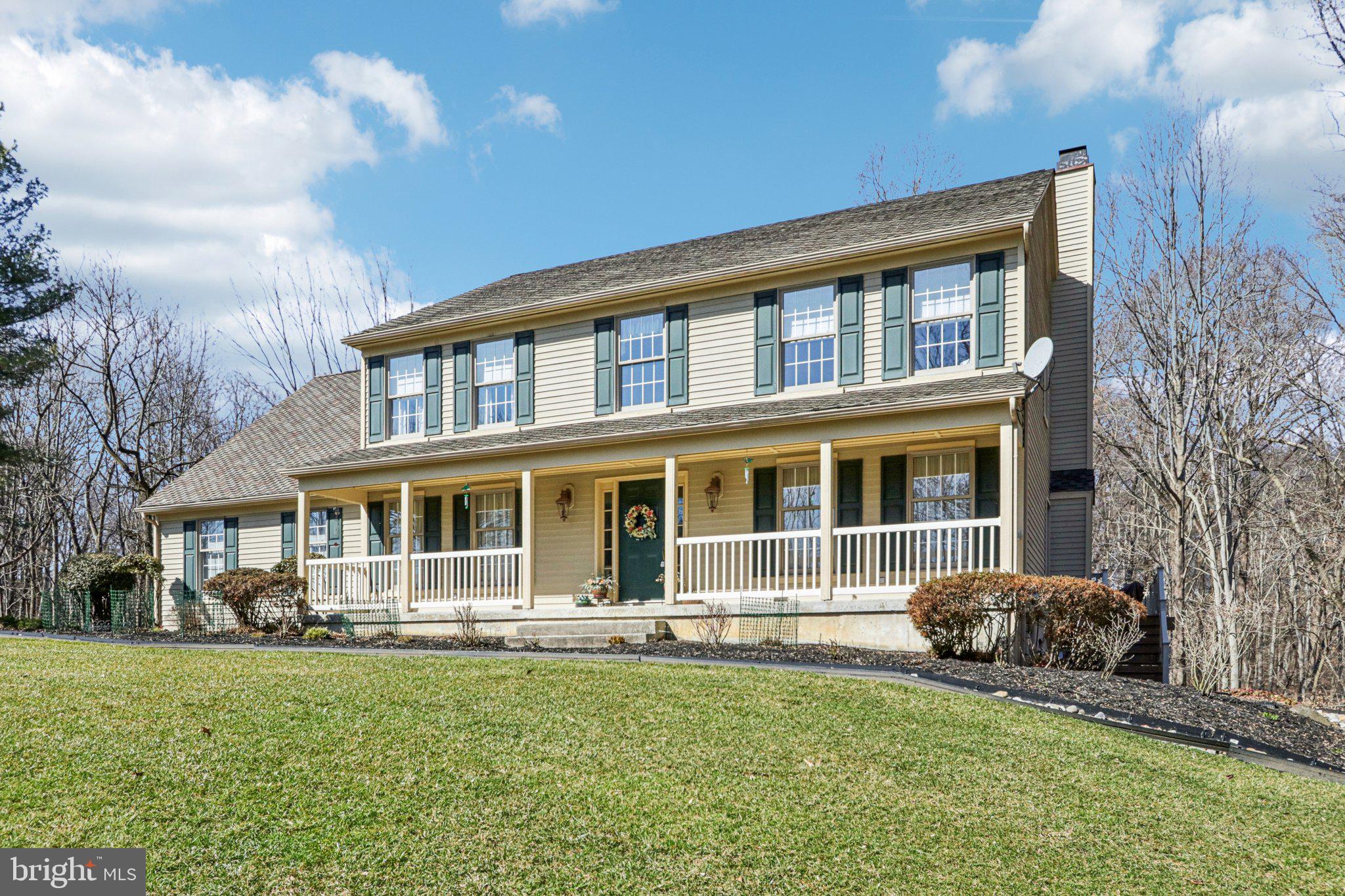 Priced to Sell! Rarely available former builder’s home tucked away on a private cul-de-sac backing to serene woods in one of the area’s most desirable communities within the Kennett Square School District. This beautifully upgraded residence located in Somerset Lake offers exceptional curb appeal with professional hardscaping, a slate entryway, and tasteful landscaping. Enjoy incredible outdoor living with a spectacular wrap-around deck overlooking a peaceful stream and wooded views, plus a covered paver patio beneath the deck—perfect for relaxing, reading, or entertaining. Inside, the home welcomes you with cathedral ceilings, custom tile flooring, high-end lighting fixtures, ceiling fans, and premium custom blinds throughout. The main level features formal living and dining rooms, a spacious family room with a gas fireplace, and a gourmet kitchen with granite countertops, a large island with seating, recessed and pendant lighting, a built-in microwave, a flat-top range, a dishwasher, and a bright bump-out breakfast area with additional cabinetry for abundant storage. Site-finished hardwood floors enhance the kitchen and dining spaces, while multiple doors provide easy access to the expansive deck, making it an entertainer’s dream. The upper level offers four generously sized bedrooms, including a luxurious primary suite with a sitting room, dual walk-in closets, and a private bath with double vanities, soaking tub, and separate shower. The finished walk-out basement provides flexible space for a game room, recreation area, craft room, or gym, along with a large unfinished storage area with built-in shelving and an additional powder room. Additional highlights include a side-entry two-car garage with a custom office/workshop, main-level laundry, a central vacuum system, fresh interior paint, ceiling fans in every bedroom, new HVAC (2026), and a 50-year architectural shingle roof. A rare opportunity to own a beautifully appointed home offering privacy, comfort, and exceptional living in a sought-after community.