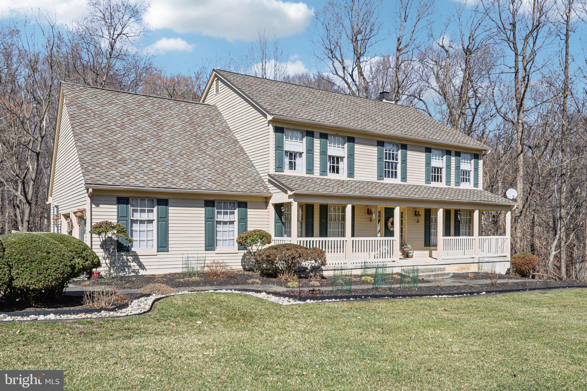 Below Market Financing available!  Inquire with the listing agent.  Rarely available former builder’s home tucked away on a private cul-de-sac backing to serene woods in one of the area’s most desirable communities within the Kennett Square School District. This beautifully upgraded residence located in Somerset Lake offers exceptional curb appeal with professional hardscaping, a slate entryway, and tasteful landscaping. Enjoy incredible outdoor living with a spectacular wrap-around deck overlooking a peaceful stream and wooded views, plus a covered paver patio beneath the deck—perfect for relaxing, reading, or entertaining. Inside, the home welcomes you with cathedral ceilings, custom tile flooring, high-end lighting fixtures, ceiling fans, and premium custom blinds throughout. The main level features formal living and dining rooms, a spacious family room with a gas fireplace, and a gourmet kitchen with granite countertops, a large island with seating, recessed and pendant lighting, a built-in microwave, a flat-top range, a dishwasher, and a bright bump-out breakfast area with additional cabinetry for abundant storage. Site-finished hardwood floors enhance the kitchen and dining spaces, while multiple doors provide easy access to the expansive deck, making it an entertainer’s dream. The upper level offers four generously sized bedrooms, including a luxurious primary suite with a sitting room, dual walk-in closets, and a private bath with double vanities, soaking tub, and separate shower. The finished walk-out basement provides flexible space for a game room, recreation area, craft room, or gym, along with a large unfinished storage area with built-in shelving and an additional powder room. Additional highlights include a side-entry two-car garage with a custom office/workshop, main-level laundry, a central vacuum system, fresh interior paint, ceiling fans in every bedroom, new HVAC (2026), and a 50-year architectural shingle roof. A rare opportunity to own a beautifully appointed home offering privacy, comfort, and exceptional living in a sought-after community.