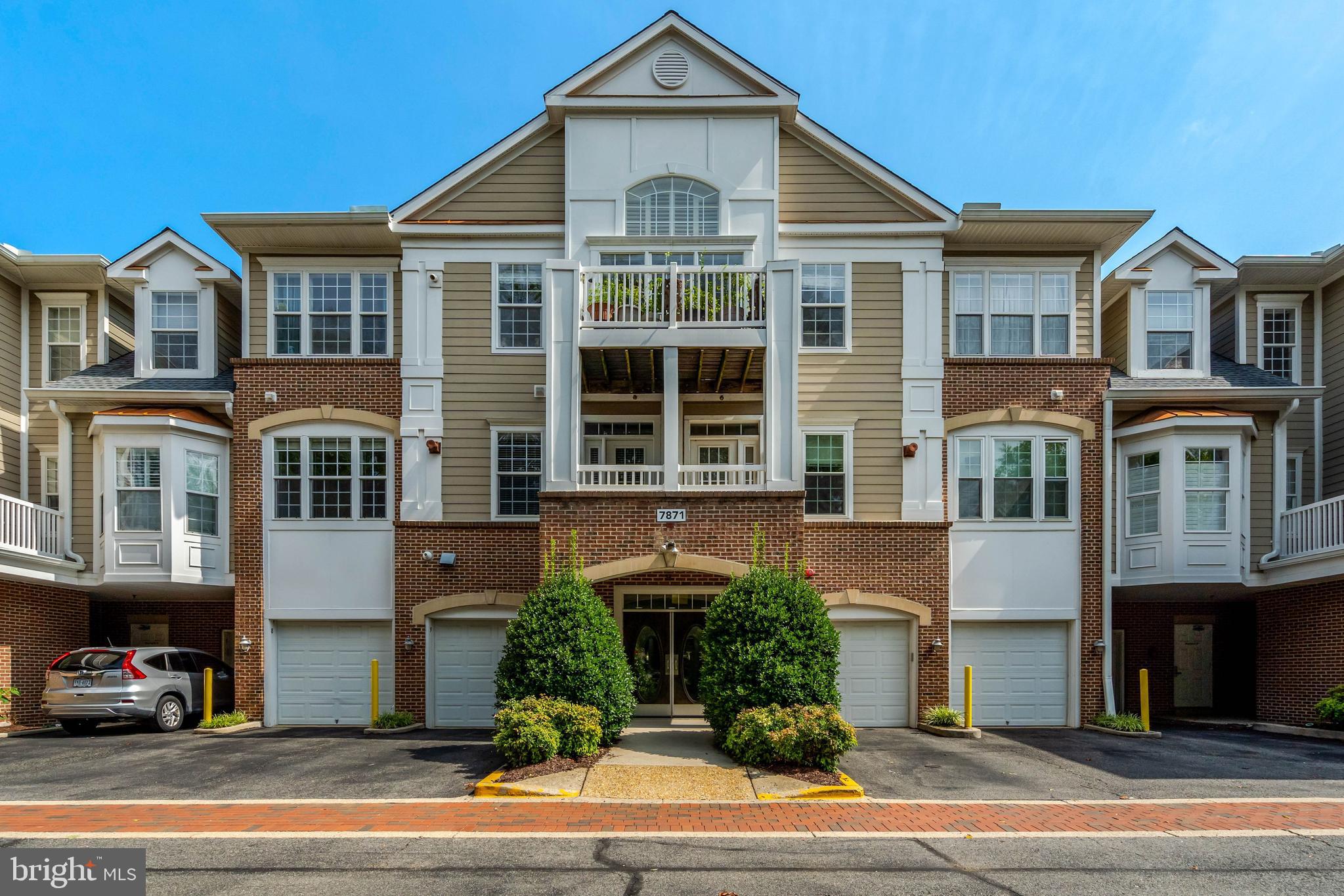 Come and visit this stunning penthouse in beautiful Hiddenbrooke. This lovely 55+ community is well kept and the vast majority of residents are owners. This beautifully maintained 2-bedroom, 2-bath top floor unit offers 1,676 square feet of comfortable living space, along with a 1-car garage (garage #6). Because is on the top floor, this unit has 12 foot (versus 10 foot) ceilings, giving this unit that wonderfully luxurious feeling. Tucked into a private corner of the building, the unit offers added tranquility and amazing natural light throughout. A welcoming foyer opens to a  spacious living room featuring elegant crown molding, a cozy fireplace, and access to a private balcony. The flexible floor plan allows you to use spaces in so many different ways. Some residents use the study area as the dining room. Others use the space off the kitchen as a true sunroom. The primary suite has both a walk-in closet, a second spacious closet, and an en-suite bath with a large double vanity, soaking tub, and a separate shower. A second light-filled bedroom and a full bathroom provide a comfortable experience for guests. A conveniently located laundry room sits just off the front entry along with a coat closet and a linen closet. The HVAC system and the hot water heater were replaced in 2025, and the hardwoods, the dishwasher and the washer/dryer are just a couple of years old.  The building is equipped with an elevator (that takes you right from your doot to your private garage) and two wide stairwells. Residents of the friendly Hiddenbrooke community enjoy regular social events including book clubs, card games, Mahjong, chili cook-offs and so much more. What a great place to live! Hiddenbrooke has a community center with a meeting space, kitchen, exercise room, and a library. “The Bistro,” located just across the street, offers an outdoor patio with a grill. This development is ideally located near wonderful shopping and dining, Fairfax County Parkway, I-395, I-495, and I-95, as well as close to Franconia Metro, bus routes, Fort Belvoir, commuter lots and wonderful parks, trails and lakes throughout Springfield. Many residents enjoy the close-by Springfield Golf & Country Club. Whatever your interests are, if you are in the 55+ community and want independent living in a safe and wonderful development, this stunning top floor unit might be just what you have been waiting for!