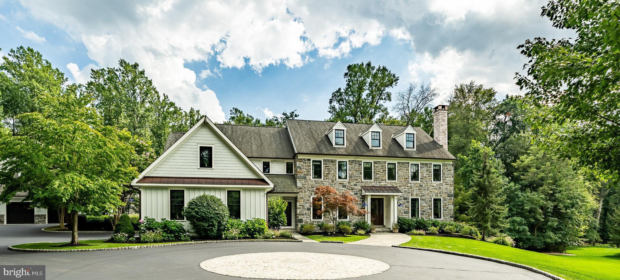 Welcome to this stunning 5 bedroom house with 6 ½  bathrooms, detached garage game room with 1 ½ baths, expansive outdoor entertainment area with pool and hot tub, and media room, situated on a sprawling private 8.27-acres located in the highly sought-after Great Valley School District. This home is in excellent condition and boasts a range of desirable features, including a new chef’s kitchen installed by Dilworth Custom featuring Sub-Zero refrigeration, wine storage, and refrigerator drawers, ice maker, Aga Elise range, Miele dishwasher, custom cabinet hardware and hand crafted range hood.  New exterior featuring Pella Architect Series windows in black, Arctic white Hardy siding, shingles and board and batten, and natural media mica stonework. Smart home ready with mesh wi-fi, whole house audio, lighting controls, garage door controls and security. 35KW generator with automatic transfer switch. Custom timber frame family room with vaulted ceiling.  All major HVAC systems recently updated. Generous list of inclusions for the new owner.  The home has too many fantastic features to list. The kitchen and breakfast areas are perfect for entertaining with its massive butcher block island with plenty of seating both at the island and the breakfast room which has access to the patios and pool. The entire home has plenty of natural light bursting through the gorgeous windows. This home is so special and beautifully cared for. Nothing but owner pride and so much love within these walls. Call agent with any questions that you may have.