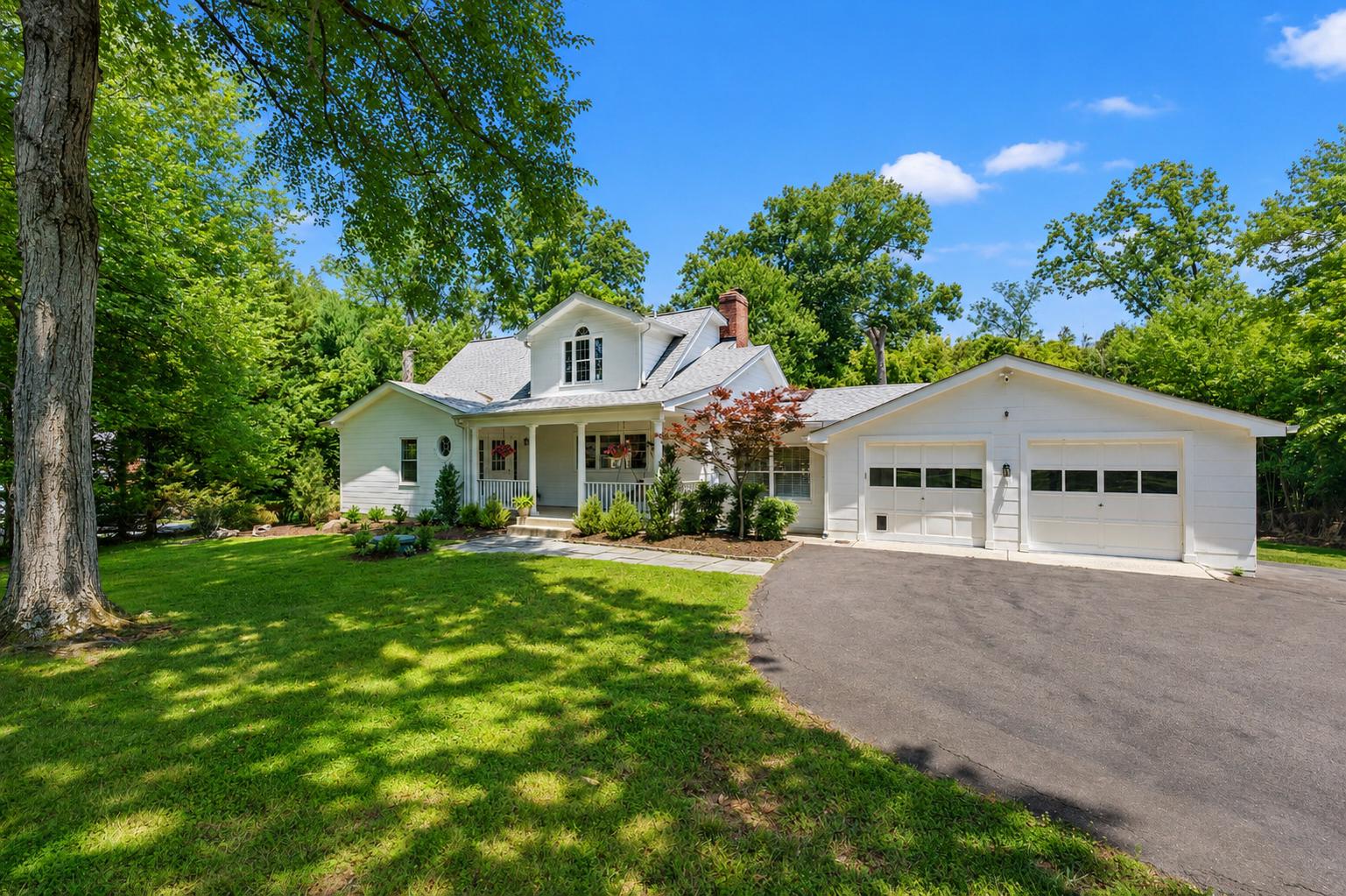 ** Open House Sunday, July 5 from 1-3pm.**

Nestled on a picturesque one-acre lot in Vienna's sought-after Five Oaks community, this charming Cape Cod-style home offers the perfect blend of timeless character, modern comfort, and exceptional outdoor living. With 2,854 square feet of thoughtfully designed space, this inviting residence welcomes you with a classic front porch complete with a porch swing—the perfect place to relax and enjoy the peaceful surroundings in the pool with spa.

The main level is designed for both everyday living and effortless entertaining, featuring two bedrooms, a bright and airy sunroom, and a warm, inviting living room filled with natural light. The gourmet kitchen is equipped with stainless steel appliances, a cozy breakfast area, and flows seamlessly into the elegant dining room, where custom built-ins and a beautiful fireplace create the perfect setting for gatherings.

Upstairs, the private primary suite serves as a tranquil retreat, complete with an ensuite bath and a cedar-lined closet with laundry room. 

Step outside to your own backyard oasis. The outdoor space features an in-ground pool and spa, expansive deck, and storage shed, making it ideal for entertaining, relaxing, or enjoying warm Virginia summers. Backing to mature trees, the property offers exceptional privacy while maintaining a welcoming neighborhood feel.

Located in the desirable Five Oaks community, this home is just minutes from parks, top-rated schools, shopping, dining, and major commuter routes, offering the perfect balance of peaceful living and everyday convenience.
