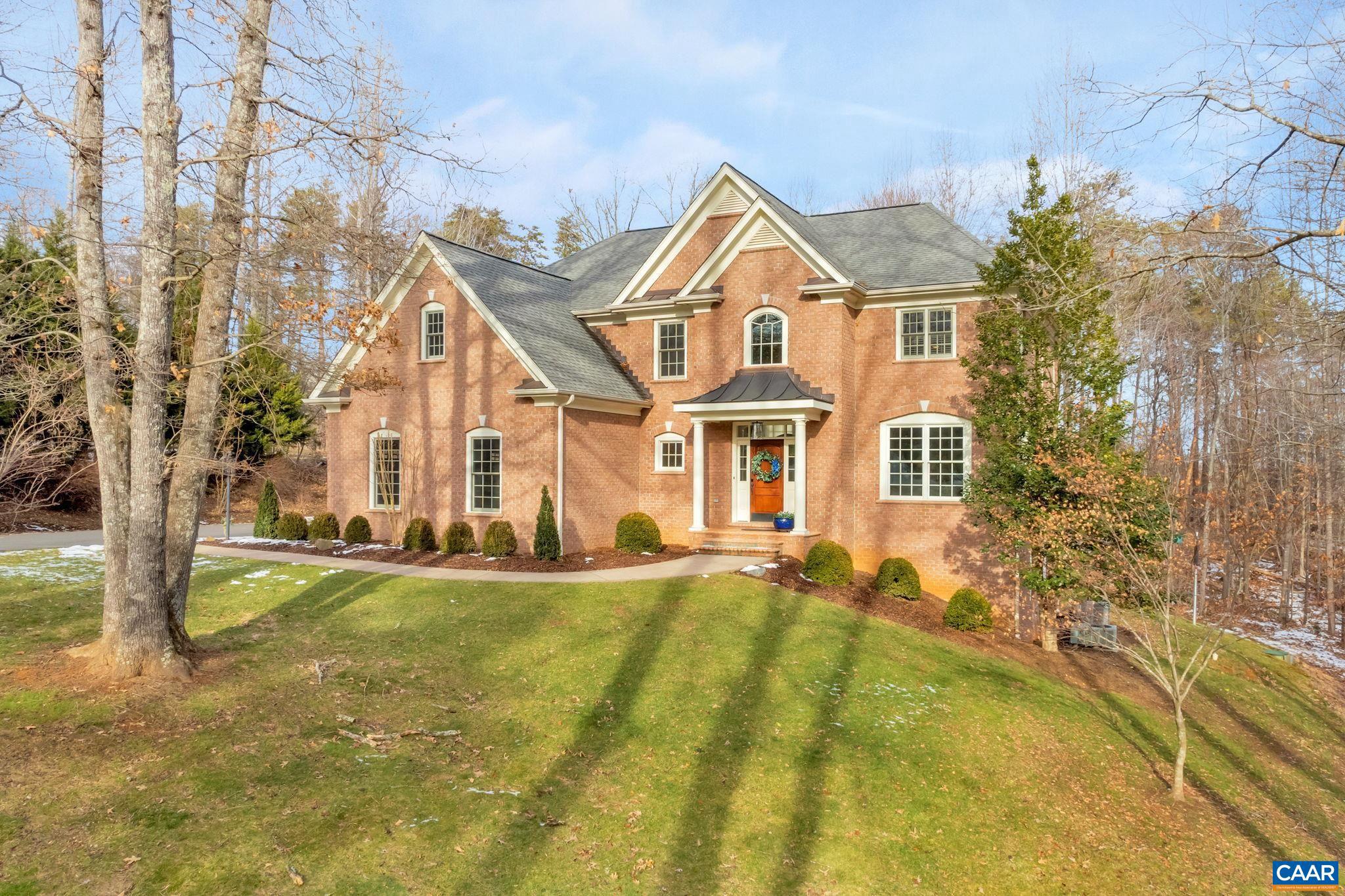 Welcome to your dream home! Step into luxury with this stunning property, located in the sought-after Proffit Ridge neighborhood. The moment you walk through the front door, you'll be captivated by the fantastic updates, elegant hardwood floors, abundance of natural light streaming through the windows and the meticulously landscaped gardens. This home boasts spacious living areas, perfect for both relaxation and entertaining guests, as well as extended family needs. The gourmet kitchen is a chef's delight, featuring top-of-the-line appliances and a stylish island. Retreat to the primary suite, an oasis of tranquility, complete with a spa-like shower and a decked out walk-in closet. The backyard is an entertainer's or gardeners? paradise, with a Trex deck, patio, and plenty of privacy. With 4 bedrooms and 4.5 baths, there's plenty of room for everyone's comfort and privacy. The 3-car garage, storage space on the terrace level and shed offer ample storage. Shops and restaurants are moments away, offering the perfect blend of luxury and convenience.,Painted Cabinets,Quartz Counter,Fireplace in Family Room,Fireplace in Kitchen
