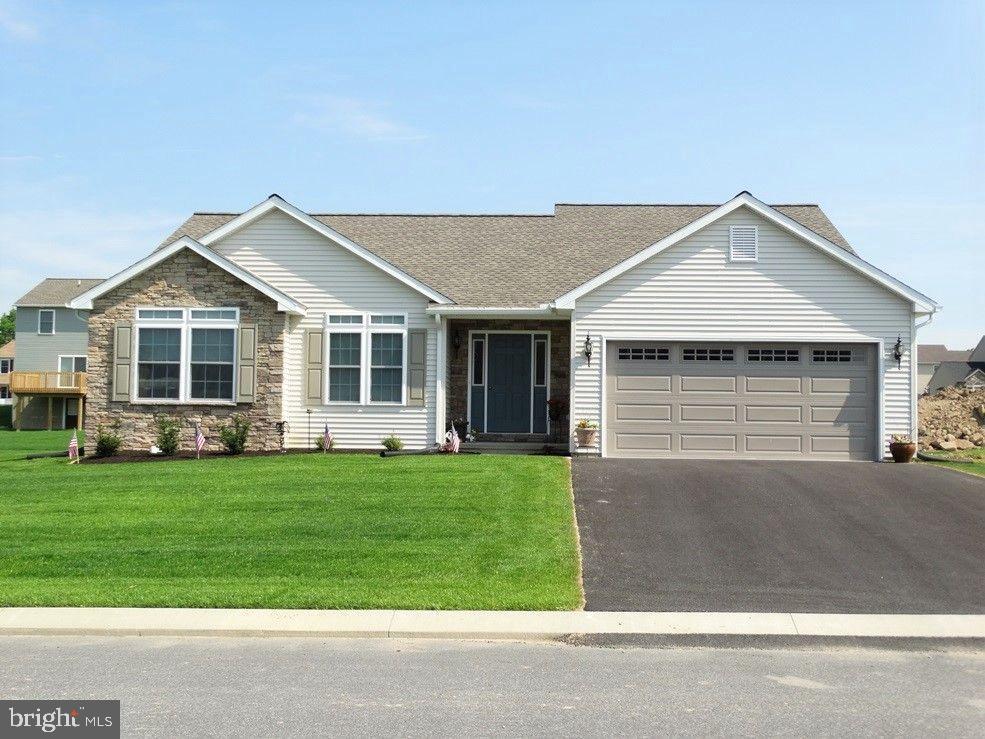 Enjoy convenient 1-floor living in this beautifully kept ranch. It offers a bright airy living room with cathedral ceilings, beautiful kitchen and dining room with doors to a rear patio. The master bedroom has a large walk-in closet and a private bathroom with a double-bowl vanity. This home has a full basement that is partially finished and a two-car garage! Schedule a showing today!