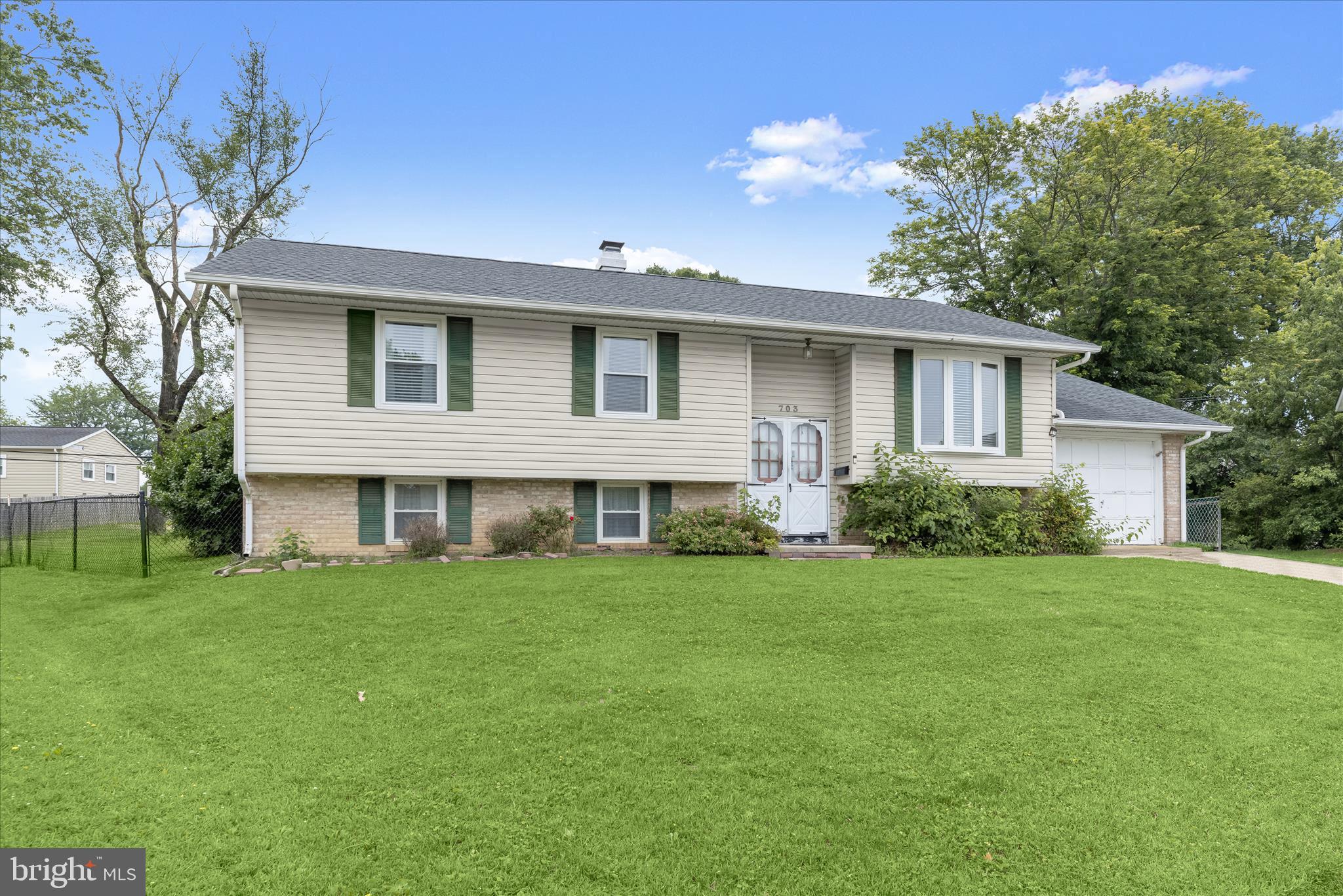 Welcome to this five bedroom, two bathroom home set on a quarter-acre lot at the end of a cul-de-sac in the Edge Mead neighborhood. Inside, the main level features hardwood floors with an inviting front living room and a separate dining area. The eat-in kitchen has space for a breakfast table with access outside to the rear porch, and replaced refrigerator, dishwasher and built-in microwave. The main level includes three bedrooms, one of which is the primary that has access to the hall full bathroom. Downstairs, the fully-finished lower level expands the living space with a large recreation room. Two additional bedrooms are on this level with a shared bathroom that has a walk-in shower. The laundry room offers plenty of storage space and walk-out stairs. Enjoy spending time outside in the fenced backyard with a porch off the kitchen, along with a patio and basketball hoop. The attached one-car garage also provides additional storage space. Excellent location right off Emmorton Road just minutes from Pulaski Highway and I-95 for easy commuting. Recent updates in the last few years include a new roof, gutter guards, water heater, dryer and fence.