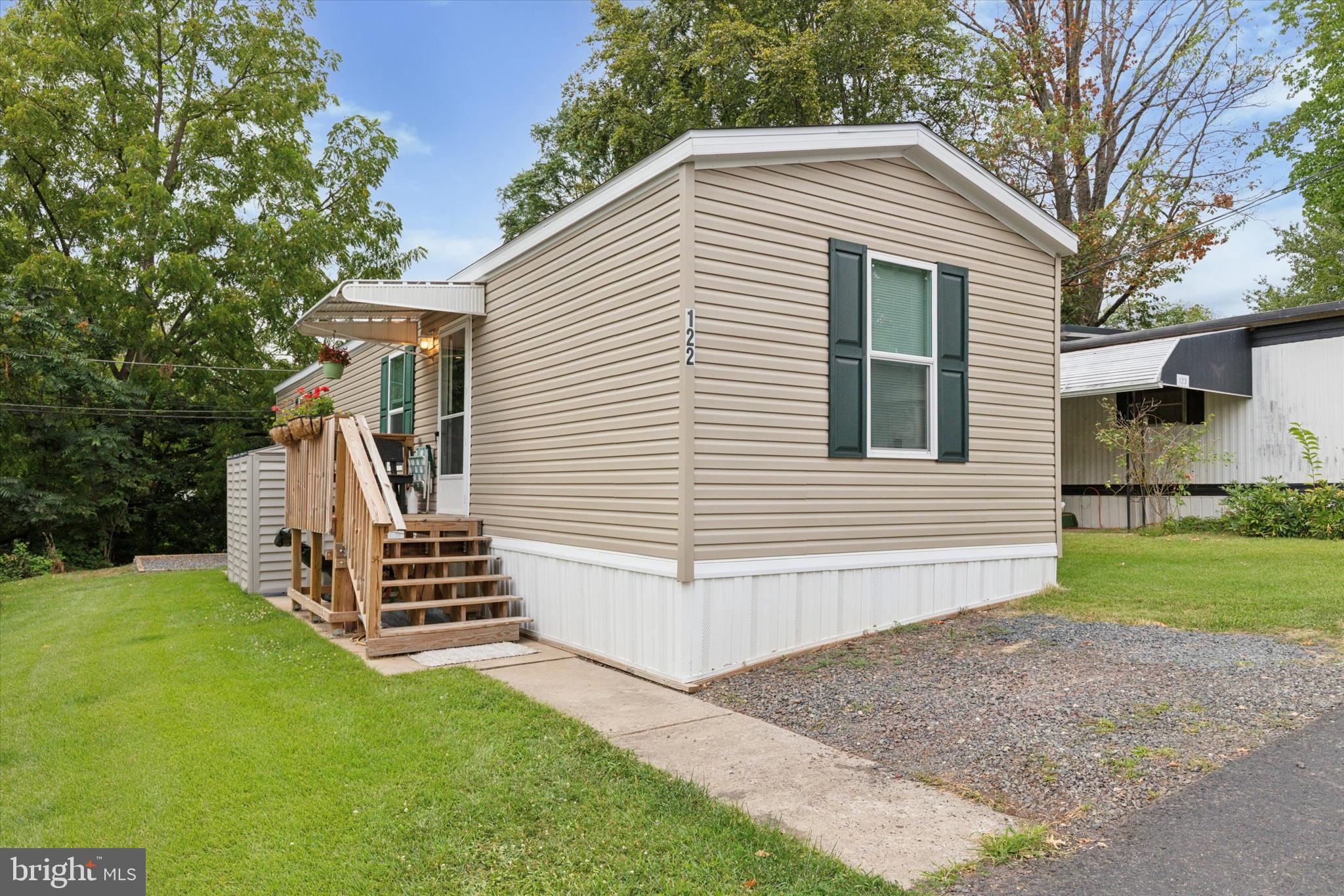 Welcome to 3000 E High St – an affordable and move-in-ready manufactured home offering comfort, convenience, and modern living! Step inside this well-maintained 2-bedroom, 2-bath home . You will  be greeted by an open-concept layout filled with natural light. The spacious living room flows into the kitchen, which features plenty of cabinet space, a double sink, and a breakfast island perfect for casual dining. The bathroom is  designed with a large walk-in shower and modern finishes. Both bedrooms offer cozy retreats with ample closet space. Enjoy outdoor living with a welcoming front porch, perfect for morning coffee or evening relaxation. The property also offers off-street parking and a storage shed for added convenience. Located in a peaceful community, this home is close to shopping, dining, and major routes for an easy commute.  Don’t miss this great opportunity to own an affordable, low-maintenance home in a convenient location! Make your appointment today!