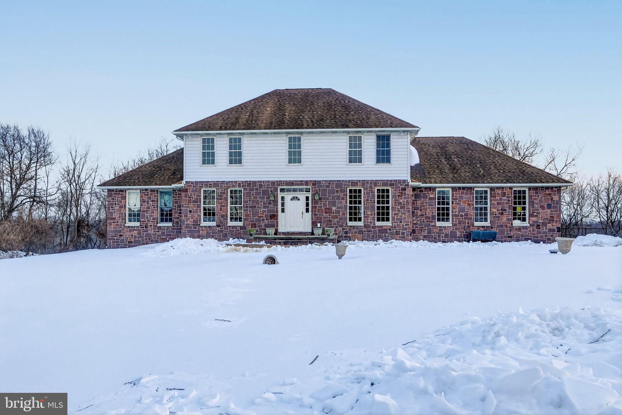 Highest and best offers due by Monday March 16th at 1pm. 
17± Acres?  Look no further......
Welcome to 8212 Sixes Bridge Road – a beautiful countryside property offering the perfect blend of classic style, functional outbuildings, and open space. Set on approximately 17 acres with a mix of open fields and woods, this property is ideal for hobby farming, animals, or simply enjoying the quiet of rural living.  The home features newly refinished hardwood floors on the main level, a two-story great room with fireplace (made from the original farmhouse) with walk-out onto the private composite deck with amazing views, a formal dining room, and a separate living room—providing both open gathering spaces and private retreats.  Outside, you'll find a large traditional bank barn full of character and utility, along with a milking barn with a floored upper-level area, this property is ready for your livestock, storage, or creative repurposing. You will find a small tenant house/office for extra space.  Whether you're dreaming of a homestead, a weekend getaway, or a place to spread out and grow, this one-of-a-kind property offers space, structure, and serene surroundings in scenic Detour, Maryland.