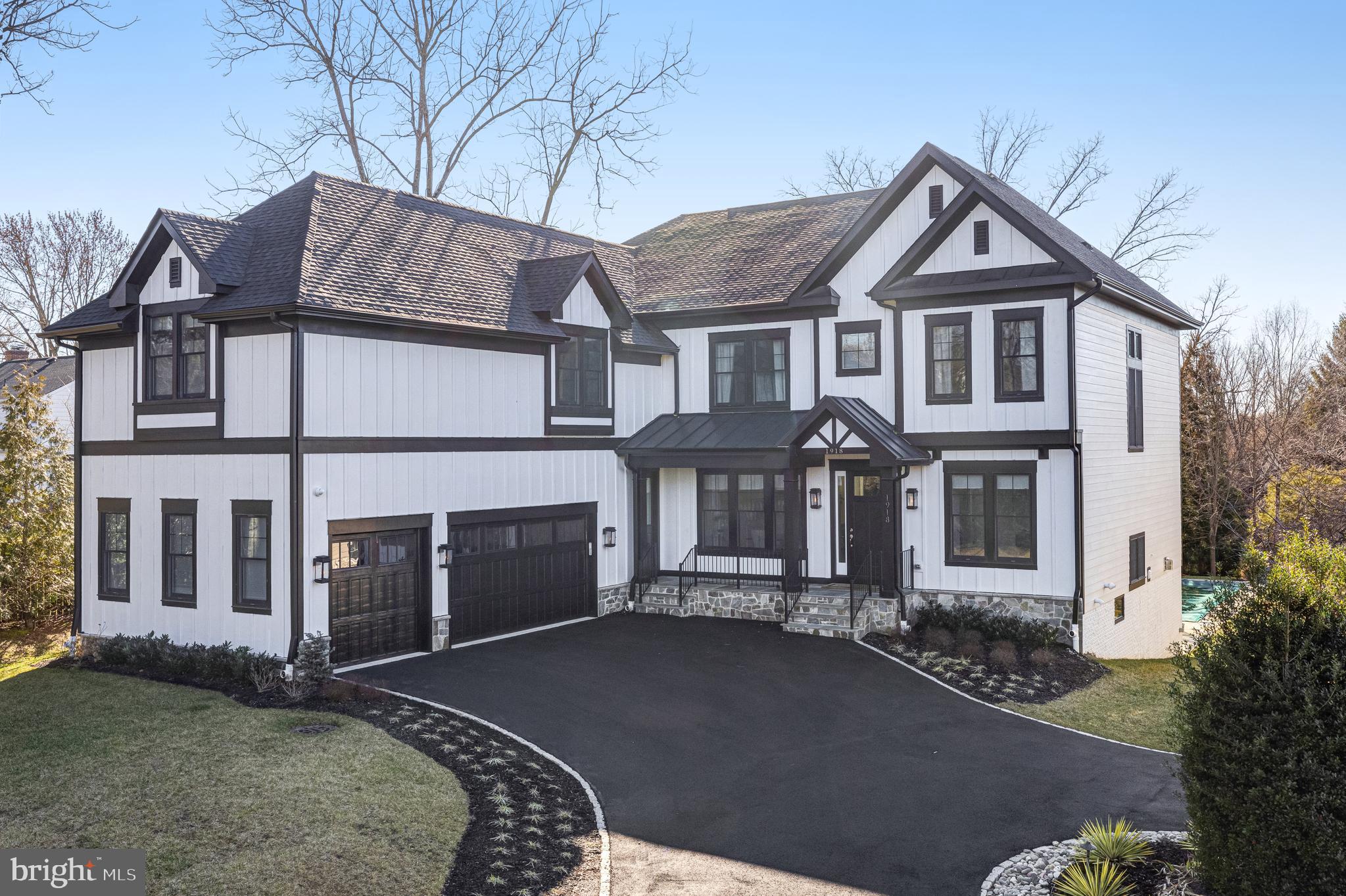 Just minutes from downtown Vienna, step into this remarkable 6 Bedroom, 6.5 Bathroom residence on a beautiful .6-acre lot and completed just last year by Sekas Homes.  With generously sized living areas and natural sunlight throughout, this home is ideal for both relaxation and entertainment and showcases exceptional craftsmanship, attention to detail, and stunning outdoor living environs to create the home of your dreams.

The open floor plan adorned with high-end designer lighting and neutral wide-plank floors throughout provides a calming and seamless flow between rooms and ample space for memorable gatherings and cherished moments.  The heart of the home is the gourmet Kitchen equipped with top-of-the-line Jenn-Air appliances, sleek quartz countertops, oversized Island, and ceiling height white cabinetry.  It truly is a chef's dream come true, perfect for creating culinary masterpieces and holiday memories.

The main level also features a generously sized Family Room with gas Fireplace and access to the heated screened porch, deck, and backyard oasis, large private Office with custom built-ins, and a Mudroom directly accessible from the 3-car garage sure to keep you organized and tidy.  

Retreat to the spacious Primary Suite, a sanctuary of comfort and style. Vaulted ceilings, two custom designed walk-in closets, and a spa-like ensuite bathroom with dual sink vanities, freestanding tub, and frameless glass door shower make this space a true refuge from daily life.  An additional 3 Bedrooms, all ensuite and with walk-in closets, and the Laundry Room complete the main upper level.  Not to be missed above the Garage is the private Guest Suite with high ceilings, separate Den with wet bar, Bedroom 6 and Full Bath.

The walk-out Lower Level features a massive Rec Room showcasing a wet bar with an ice maker and beverage fridge and gas Fireplace, as well as a dedicated Fitness Room with professional rubber flooring, Bedroom 5, Full Bathroom, and ample storage in the Utility Room.

Step outside to the magnificent backyard oasis to play, relax, or entertain in every season.  A heated 18’x40’ saltwater pool with multi-color LED mood lighting, water feature, spa, and auto-cover, outdoor Kitchen with grill and beverage fridge, Gazebo with gas line for a future fire pit are sure to create your private retreat and beloved gathering place for friends and family.

Other luxury upgrades include security system with cameras, in-ceiling speakers and wired for A/V components, Anderson GBG 400 series windows, 30-year Architectural Certainteed roof, custom built-ins, Trex decking, electric car charger outlets, outdoor gas lanterns, and additional fine landscaping.  

Minutes to downtown Vienna where the best local dining, shops, and cultural attractions are found, easy access to the W&OD Trail.  Close to Wolf Trap for the Performing Arts, top rated public schools, and 20 minutes to Dulles Airport make for an exceptional offering.