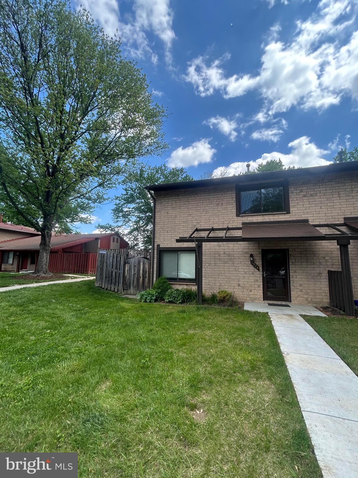 Fully Renovated Two Level Townhome ready for immediate occupancy! This spacious end unit boasts a lower level with kitchen, living , dining room space and half bath. The Kitchen renovation was done about 2 years ago, boasting white cabinetry, beautiful backsplash and stainless steel appliances. The lower level is also greeted by a side patio that is fully fenced in for privacy. This property is being managed by a property manager vouchers welcome, however property manager is looking for a quick turn time. 650+ credit score and 3x monthly rent income requirement