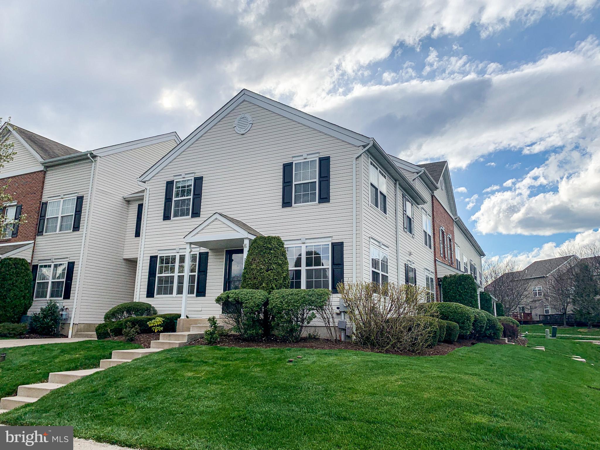 Welcome to this bright and spacious 3-bedroom end-unit townhome-style condo in Warrington’s desirable Bradford Greene community. From the moment you step inside, the home feels open and inviting, with windows on multiple sides filling the living room with natural light and giving the main level an airy, open feel that sets this larger model apart.

The main floor offers a comfortable, functional layout with a generous Living Room and Dining Room that work beautifully for everyday living and entertaining. The Dining Room flows into the Kitchen, which offers an efficient layout with ample cabinet and counter space. Whether you are hosting, working from home, or enjoying a quiet night in, the home offers the space and flexibility to fit the way you live.

Upstairs, the expansive primary bedroom offers excellent closet space, including a walk-in closet, along with room for a sitting area, home office, reading nook, or private retreat. Two additional bedrooms are well-proportioned with ample closet space, providing flexibility for family, guests, or a dedicated work-from-home setup. The hall bath includes a tub/shower combination, and a convenient powder room serves the main level.

The finished lower level is a true bonus and gives this home something memorable. Previously designed with a media-room feel, the space includes tiered flooring, sound-treatment panels, and pre-wiring already in place, creating an exciting starting point for a future theater room, gaming lounge, home gym, office, studio, or additional living area.

Residents of Bradford Greene enjoy community amenities including common grounds, playgrounds, and basketball courts, along with the ease of low-maintenance living. The monthly association fee covers roof and siding maintenance, door painting, landscaping and mulching, snow removal right to your door, and trash service. Ideally located close to shopping, restaurants, grocery stores, and major commuter routes, the community also connects directly to Nike Park, offering walking trails and direct access to nature. Located within the highly regarded Central Bucks School District, this home offers the perfect combination of space, comfort, convenience, and community.

Bright, spacious, and full of possibility, 205 Tanager Court is the kind of home that stands out. Don’t miss the chance to see it in person!