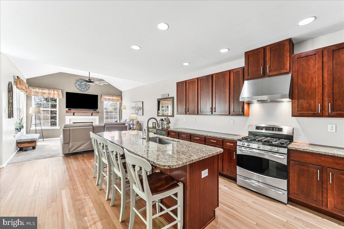 Buyer got cold feet!  Their loss, your gain!
237 Deepdale Drive is a stunning end-unit townhome  with fully finished walkout Lower Level w/ private living quarters offering the perfect combination of luxury, flexibility, and low-maintenance living in the highly sought-after Kennett Square area. This move-in ready home features refinished hardwood floors, fresh neutral paint, some new carpeting, and an open-concept floor plan designed for today’s lifestyle.

The spacious kitchen includes a large center island, abundant cabinetry, and flows seamlessly into the Family Room and Dining area—ideal for entertaining and everyday comfort. A separate living room or flex space provides the perfect home office, playroom, or formal sitting area. Enjoy outdoor living on the brand-new maintenance-free deck with upgraded railings.  A spacious 2-car Garage provides ample parking and additional storage while the HOA handles lawn care and snow removal for easy, low-maintenance living year round.

Upstairs, the second and third floors offer three spacious bedrooms, 2.5 bathrooms, and a versatile loft area perfect for a media room, office, or additional living space. The luxurious Primary Suite features two walk-in closets and a spa-inspired bathroom with a soaking tub, oversized shower, and double vanity.

The fully finished walk-out Lower Level offers exceptional flexible living space with a private bedroom, full bathroom, private laundry, spacious living and dining areas and a beautifully updated kitchenette featuring new cabinetry, induction cooktop, microwave, and refrigerator.  Sliding glass doors lead to the patio, creating a bright and inviting extension of the home.  Ideal for guests, a private home office, media room, fitness space, au pair suite, or multigenerational living.

Located minutes from world-renowned Longwood Gardens and the vibrant borough of Kennett Square, known for its boutiques, dining, breweries, and community events. Conveniently situated near major commuter routes with easy access to Philadelphia International Airport, Wilmington, West Chester, and corporate centers. This exceptional Chester County home offers luxury townhome living, flexible space, and an unbeatable location. Schedule 6-8pm weekdays, 9-7pm Saturday and Sunday