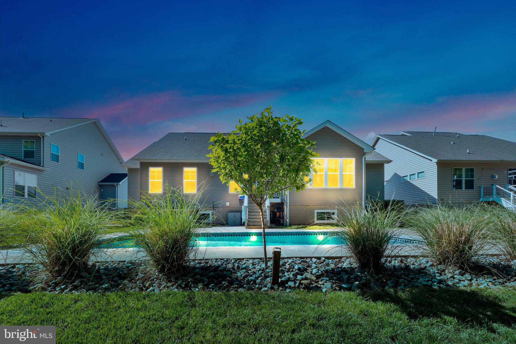 *Was temporarily off market to accommodate visiting family for graduation celebrations*
*Significant Price Enhancement on This Stunning Home*
Welcome to 4853 Point Road in Warrenton—an exceptional custom-built home by Lakeside Homes offering over 4,100 finished square feet on the main and upper levels, plus an additional 1,388 square feet in the mostly finished basement—ideal for future bedrooms, a media room, or flexible living space tailored to your needs.
This 4-bedroom, 3.5-bath home features a highly desirable main-level primary suite and private office, blending convenience with thoughtful design. The luxurious primary suite includes his and hers massive walk-in closets, offering abundant storage and everyday ease. Every detail shines, from custom moldings and board & batten accents to the quality craftsmanship Lakeside Homes is known for.
The open layout is highlighted by stunning vaulted ceilings, a butler’s pantry, and a light-filled sunroom that captures peaceful backyard views. Step outside to your private retreat featuring a professionally landscaped yard, a 30x15 chlorine gunite pool, fully fenced yard, and serene wooded backdrop—perfect for relaxing or entertaining while enjoying visits from local wildlife.
Located in amenity-rich Brookside, residents enjoy miles of scenic trails, lakes, multiple pools, and clubhouses—all just minutes from the DC side of Warrenton.
Don’t miss this rare opportunity to own one of Brookside’s most sought-after floorplans with main-level living at its finest!