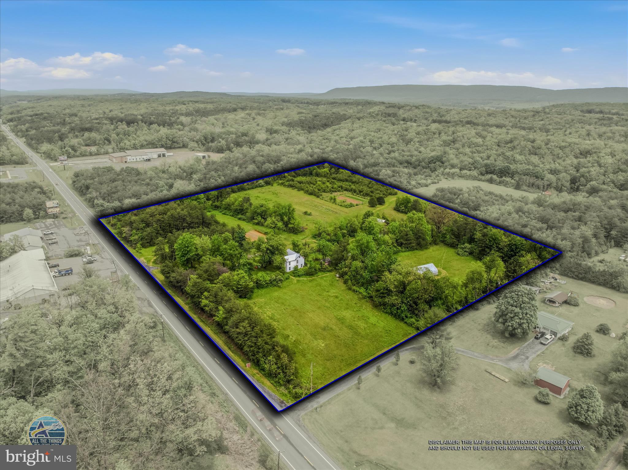 LOCATION LOCATION LOCATION!  780 of frontage along busy US Rt. 522 just 5 miles South of downtown Berkeley Springs.  Explore the possibilities of creating your very own COMMERCIAL or RESIDENTIAL investment.  Public sewer easement is already signed!   This property also has a well and septic along with an older home.   This home is considered of no value and will not be available to be shown.  Driveway currently to the property is gated.   Please make an appointment to view.   The county is accepting bids for the extension of water & sewer.  Deadline for completion is 9/2027.