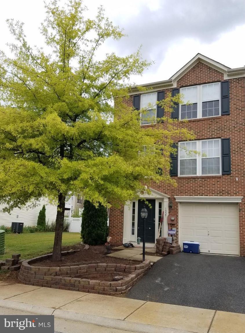 Beautiful end unit completely finished with bump outs. Offering 3BR/2BA and (2) 1/2 BA, spacious FR, LR, KI with breakfast area and dining room and a separate sunroom. Vaulted ceilings in MBR, full bath and walk-in closet, Corian counter tops, hardwood floors throughout main level, one car garage, kitchen island and so much more. Nearby restaurants, shopping and ideal for commuters.